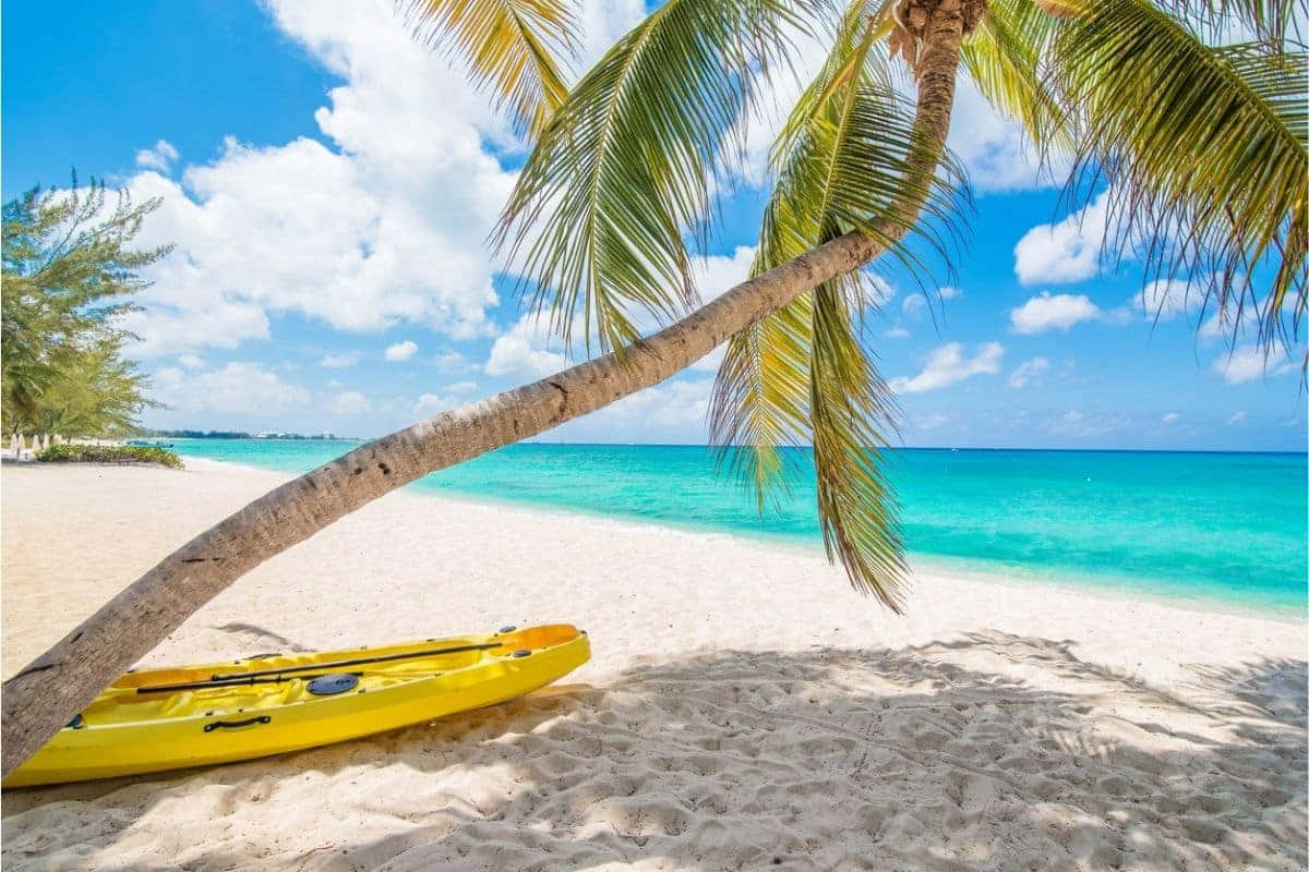 Jamaican Island, bright yellow kayak, white sand, SD Desktop Wallpaper