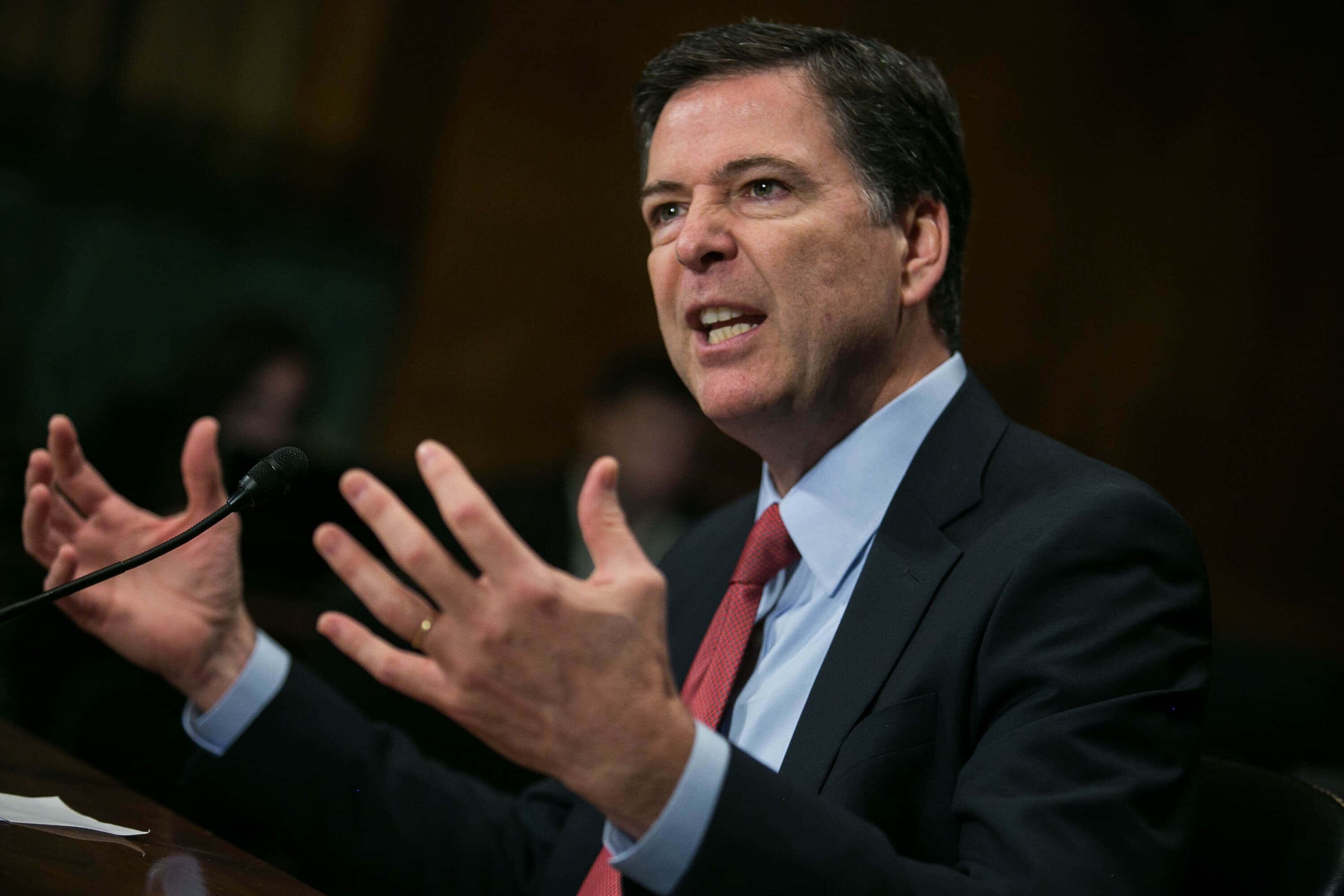 James Comey, dark suit, red tie, 2K Desktop Wallpaper