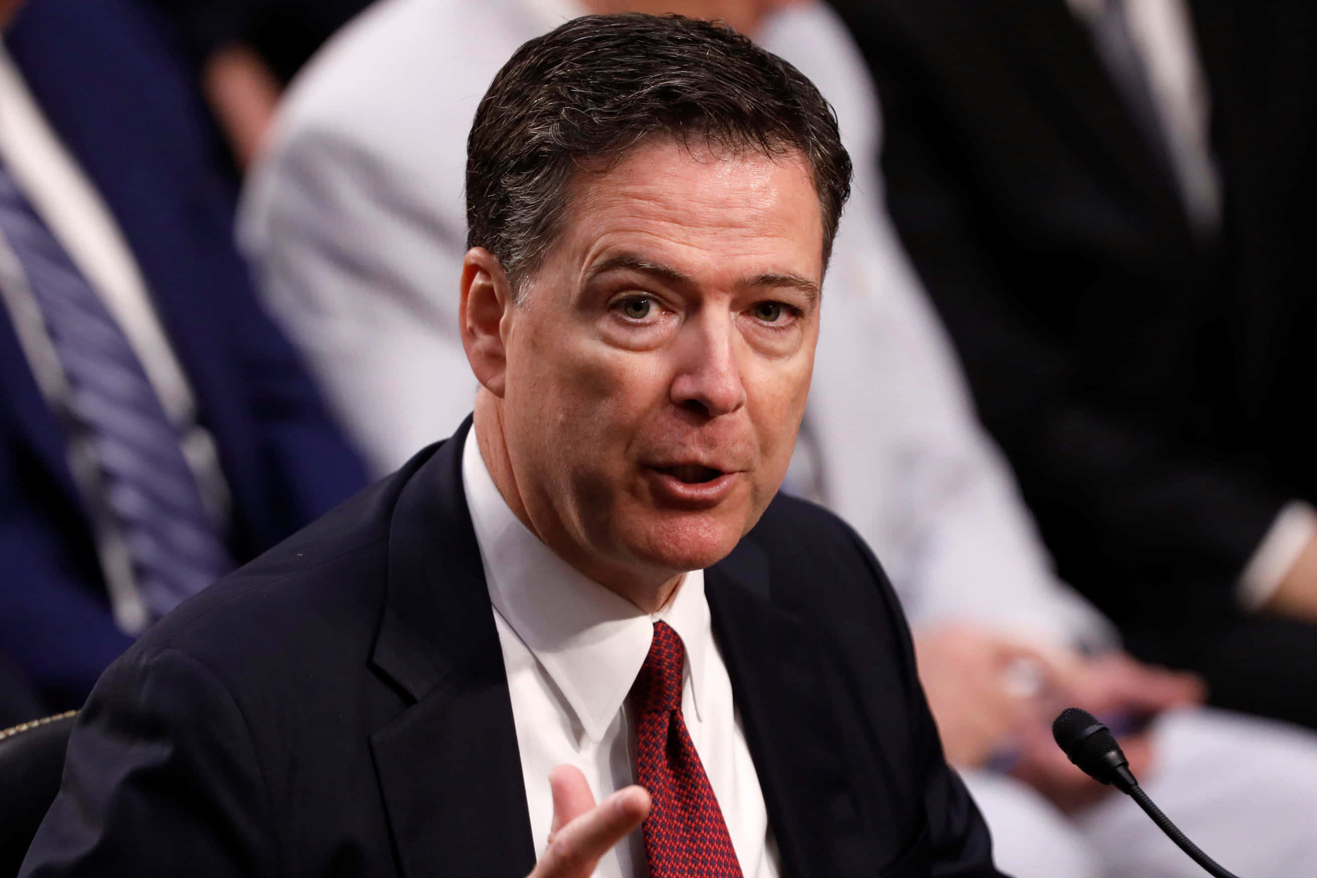 James Comey, dark suit, red tie, 2K Desktop Wallpaper