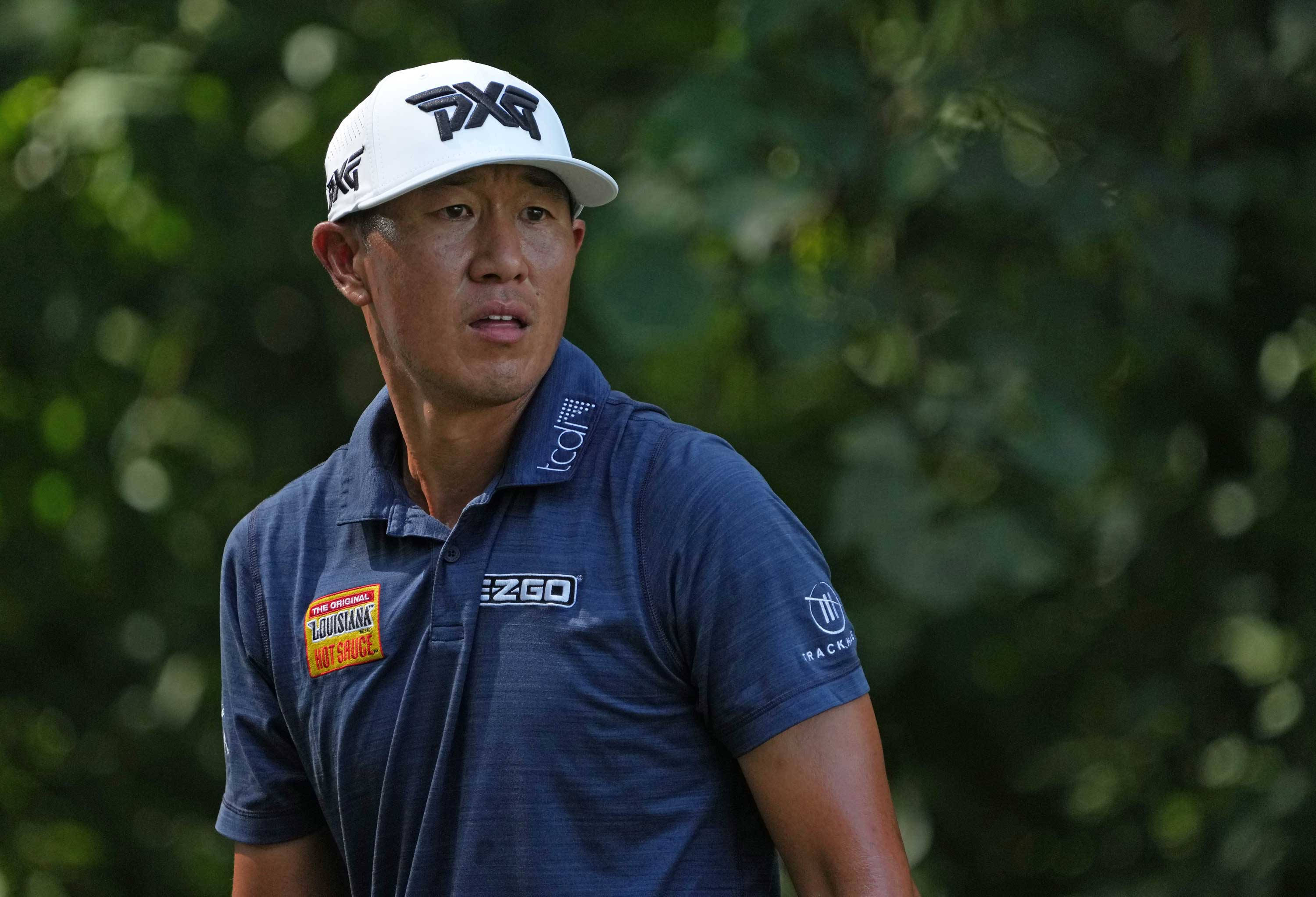 James Hahn, blue polo, white cap, 2K Desktop Wallpaper