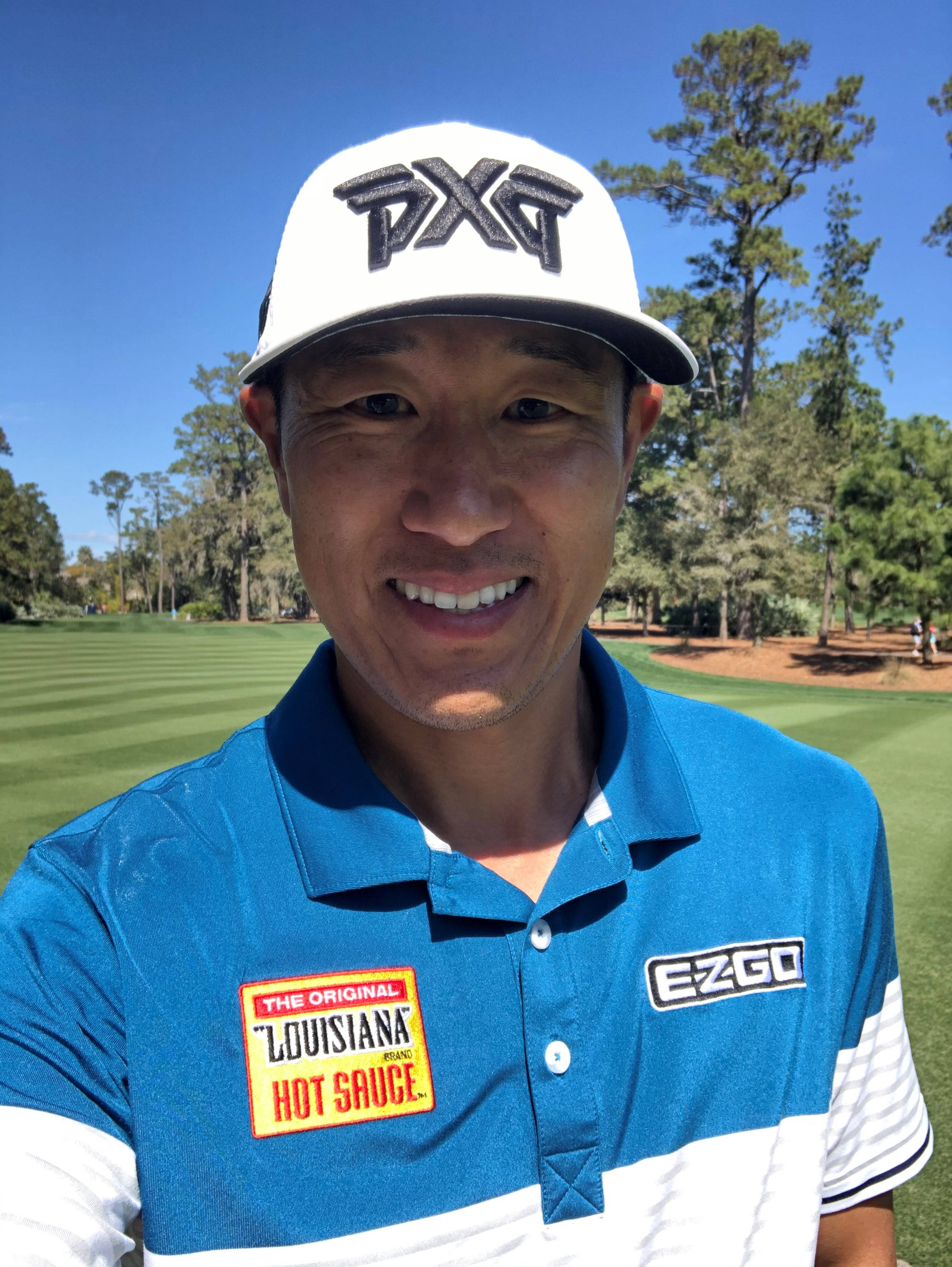 James Hahn, blue polo, white cap, 2K Phone Wallpaper