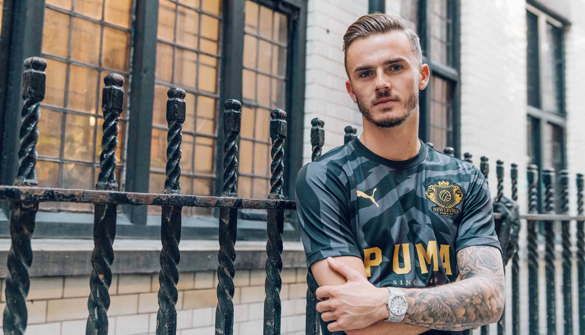 James Maddison, dark camo Puma soccer jersey, black wrought iron fence, Full HD Desktop Wallpaper