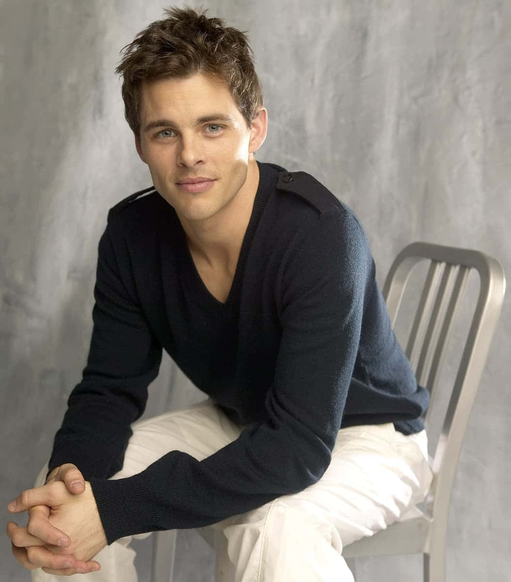 James Marsden, tousled brown hair, metal chair, SD Phone Wallpaper