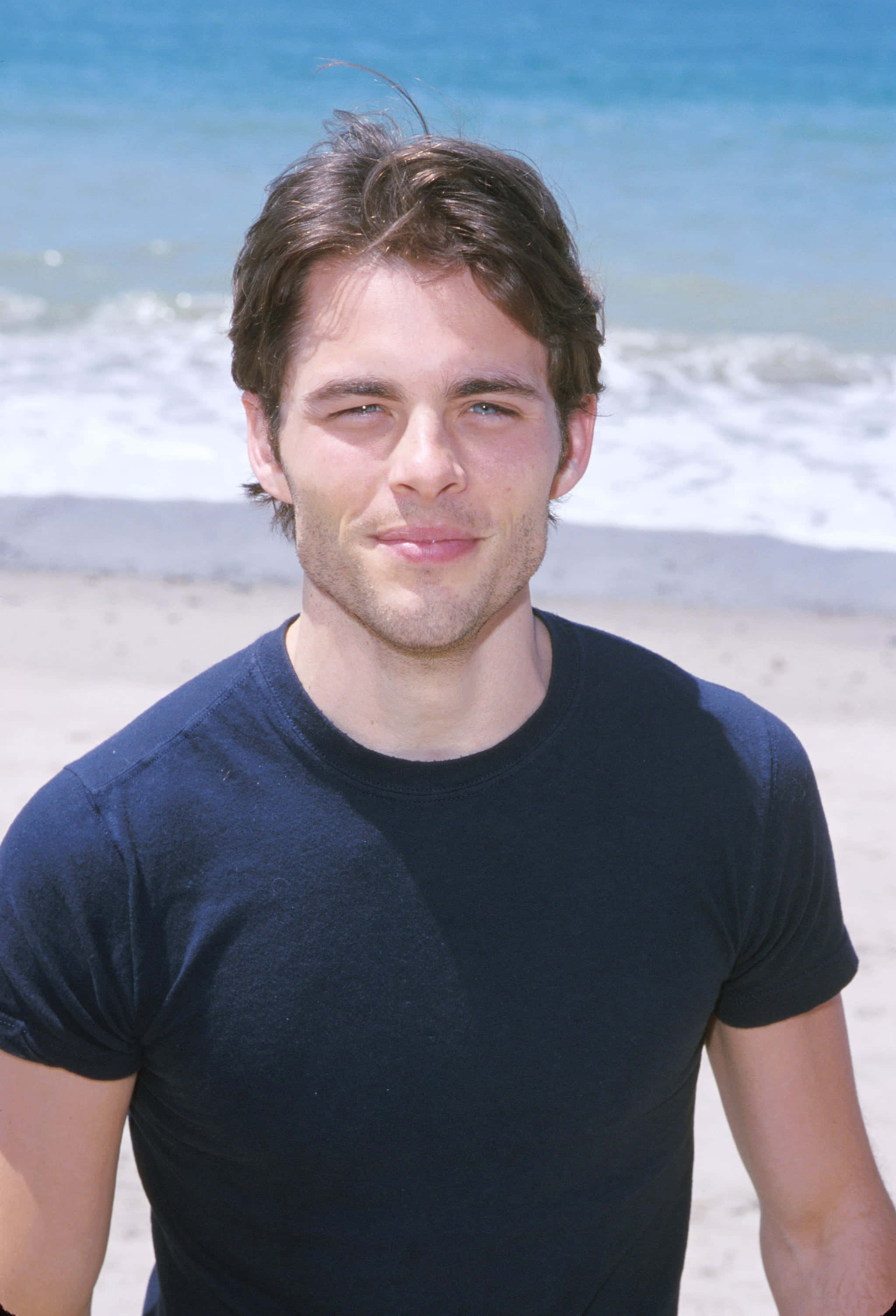 James Marsden, tousled brown hair, sunlit beach, 2K Phone Wallpaper