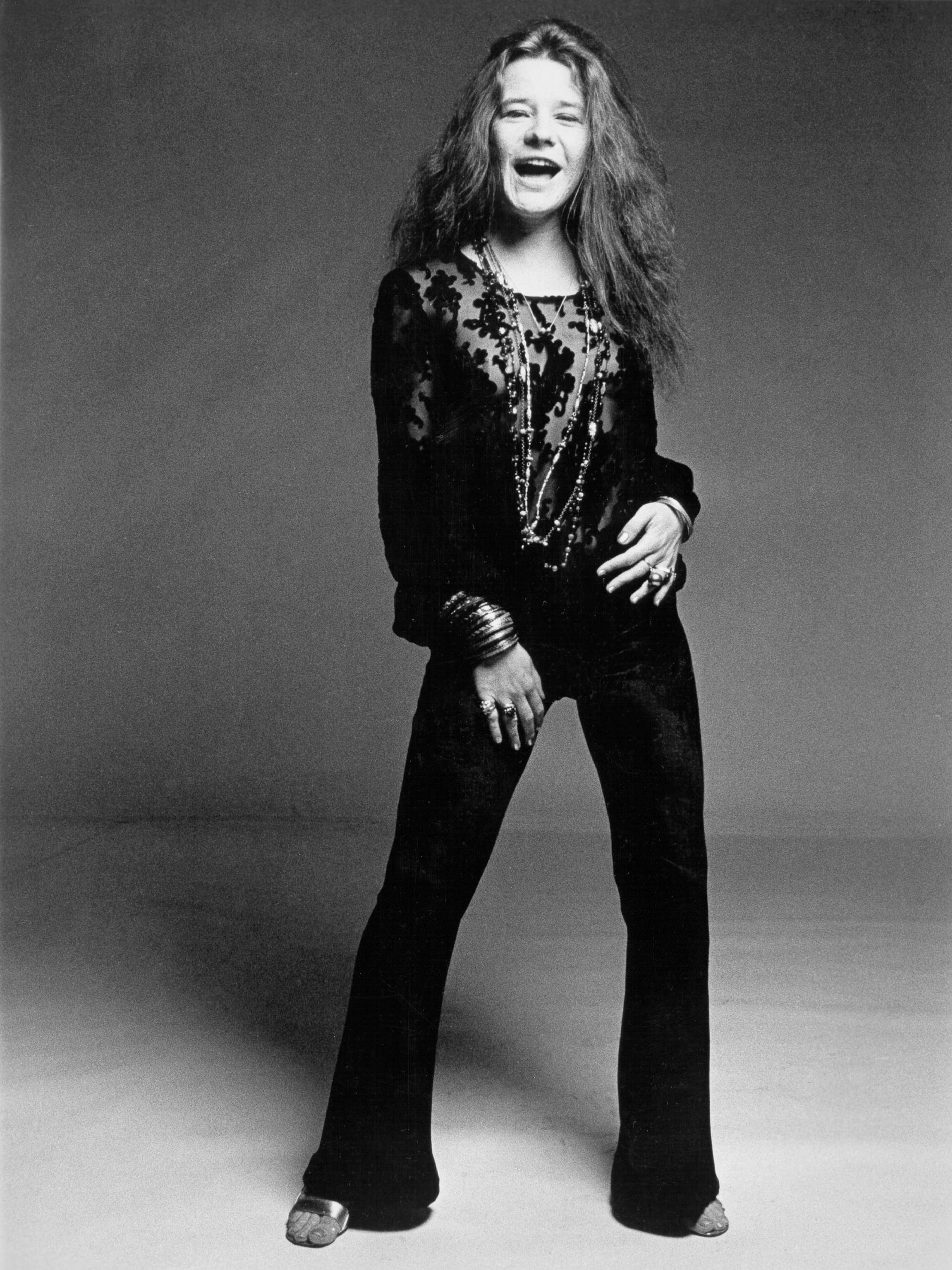Janis Joplin, black lace top, flared pants, 2K Phone Wallpaper
