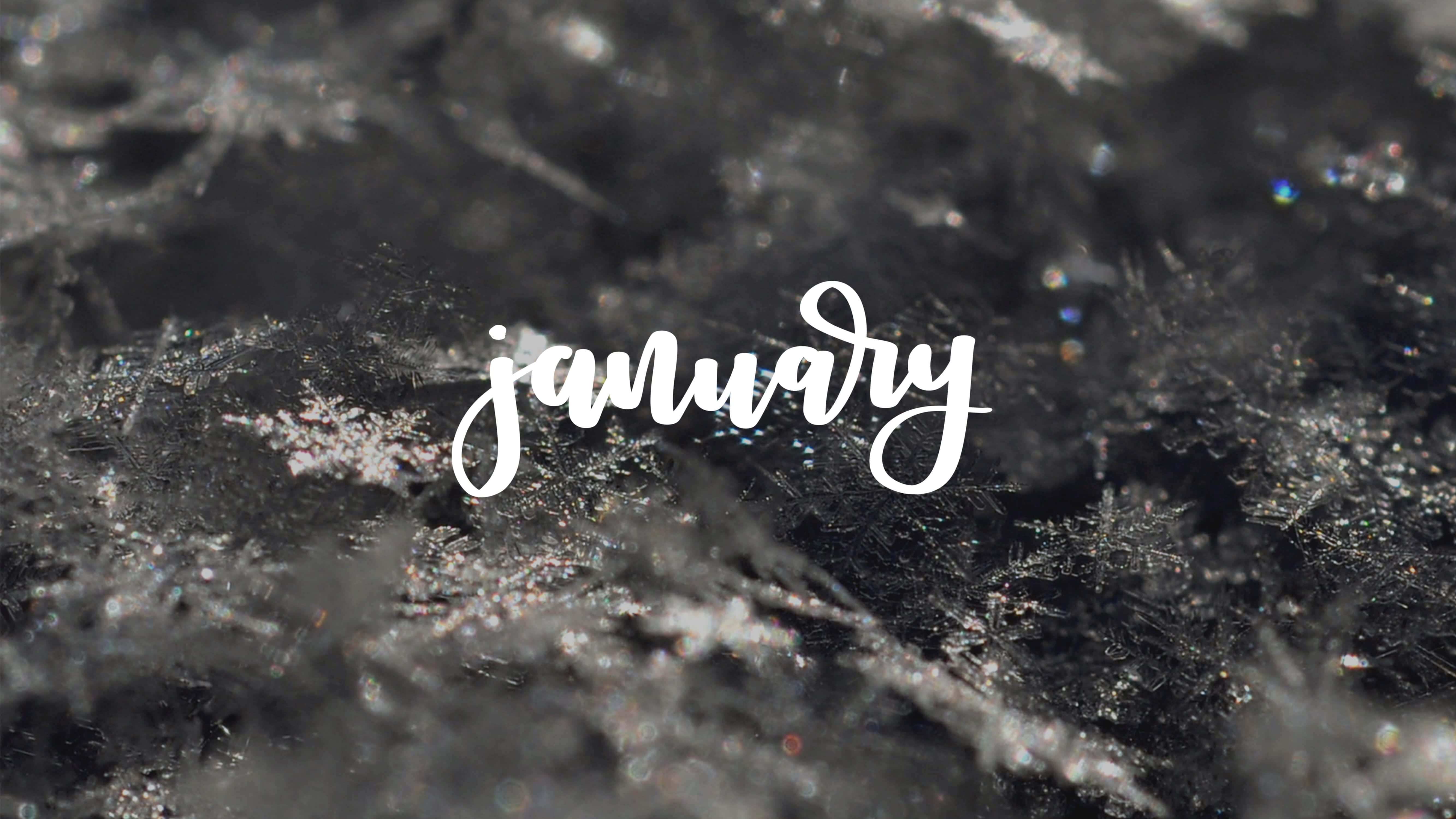 January, white cursive script, dark textured surface, 5K Desktop Wallpaper