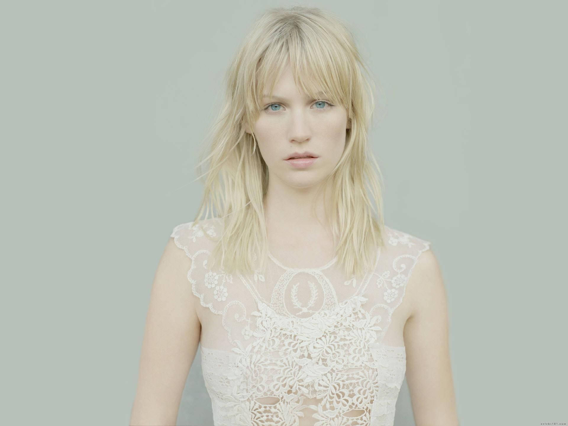 January Jones, white lace top, muted green background, Full HD Desktop Wallpaper