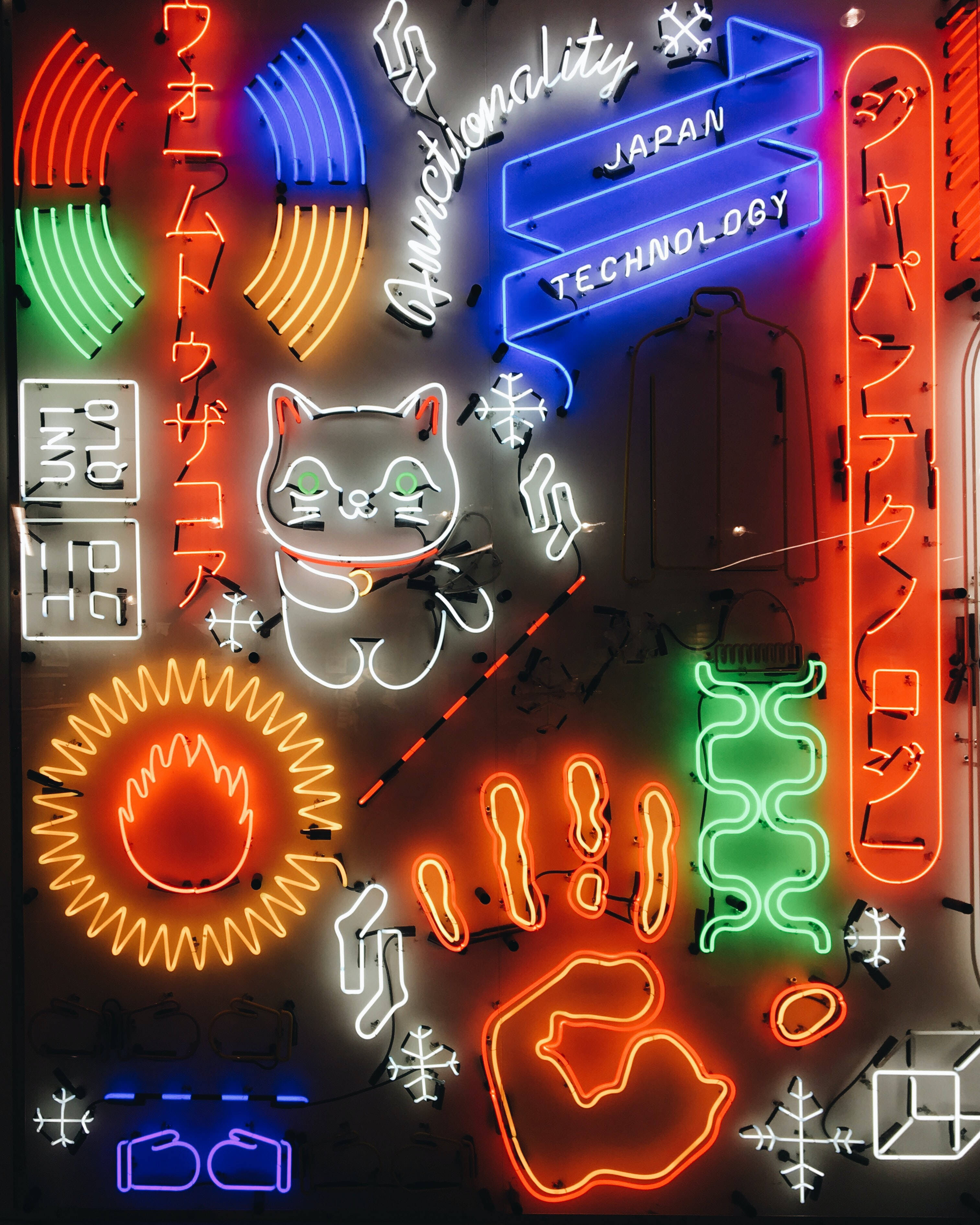 neon signs, Japanese and English, red blue green and orange hues, 2K Phone Wallpaper