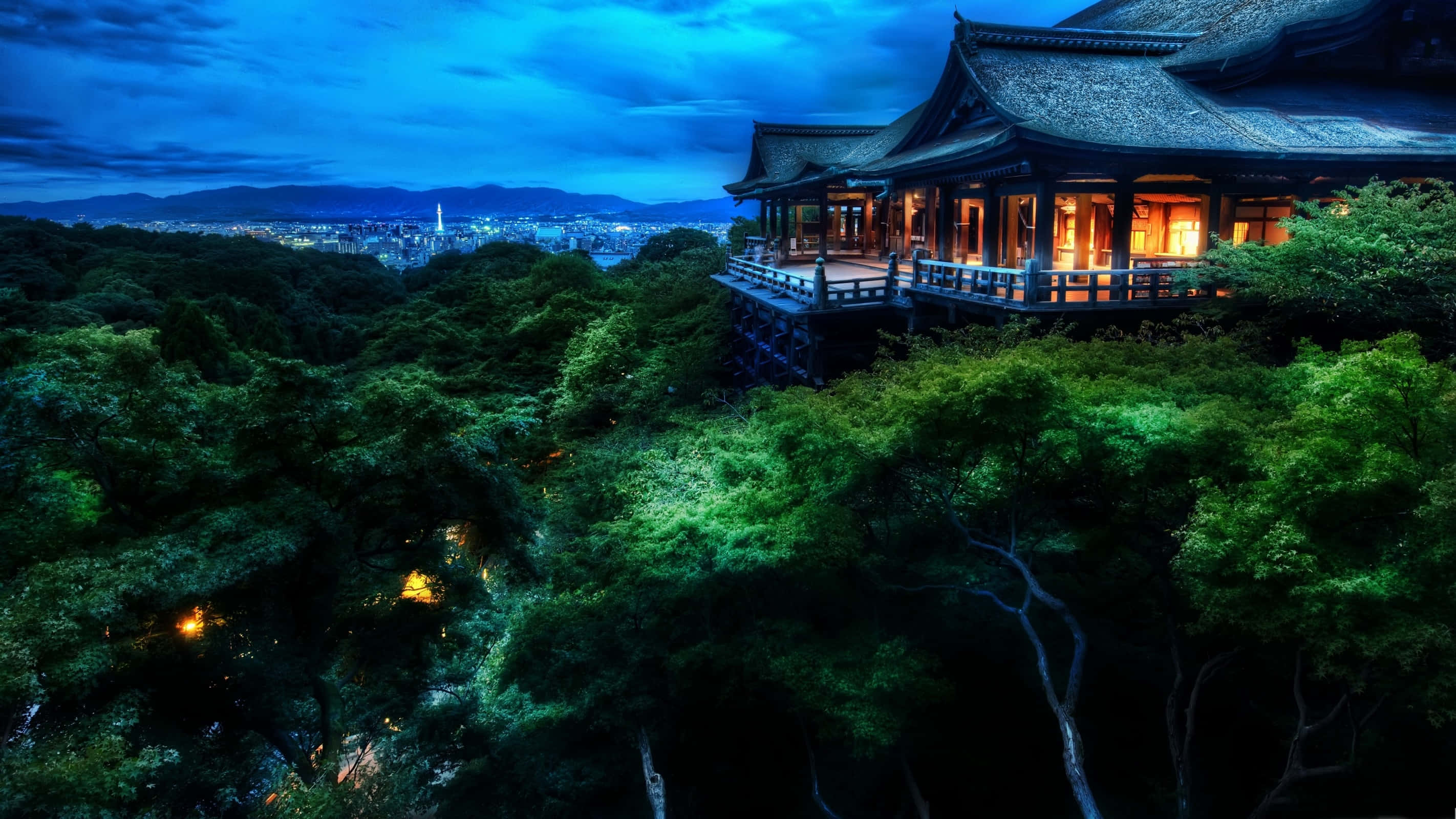 traditional wooden temple, lush green hill, sprawling city, 2K Desktop Wallpaper