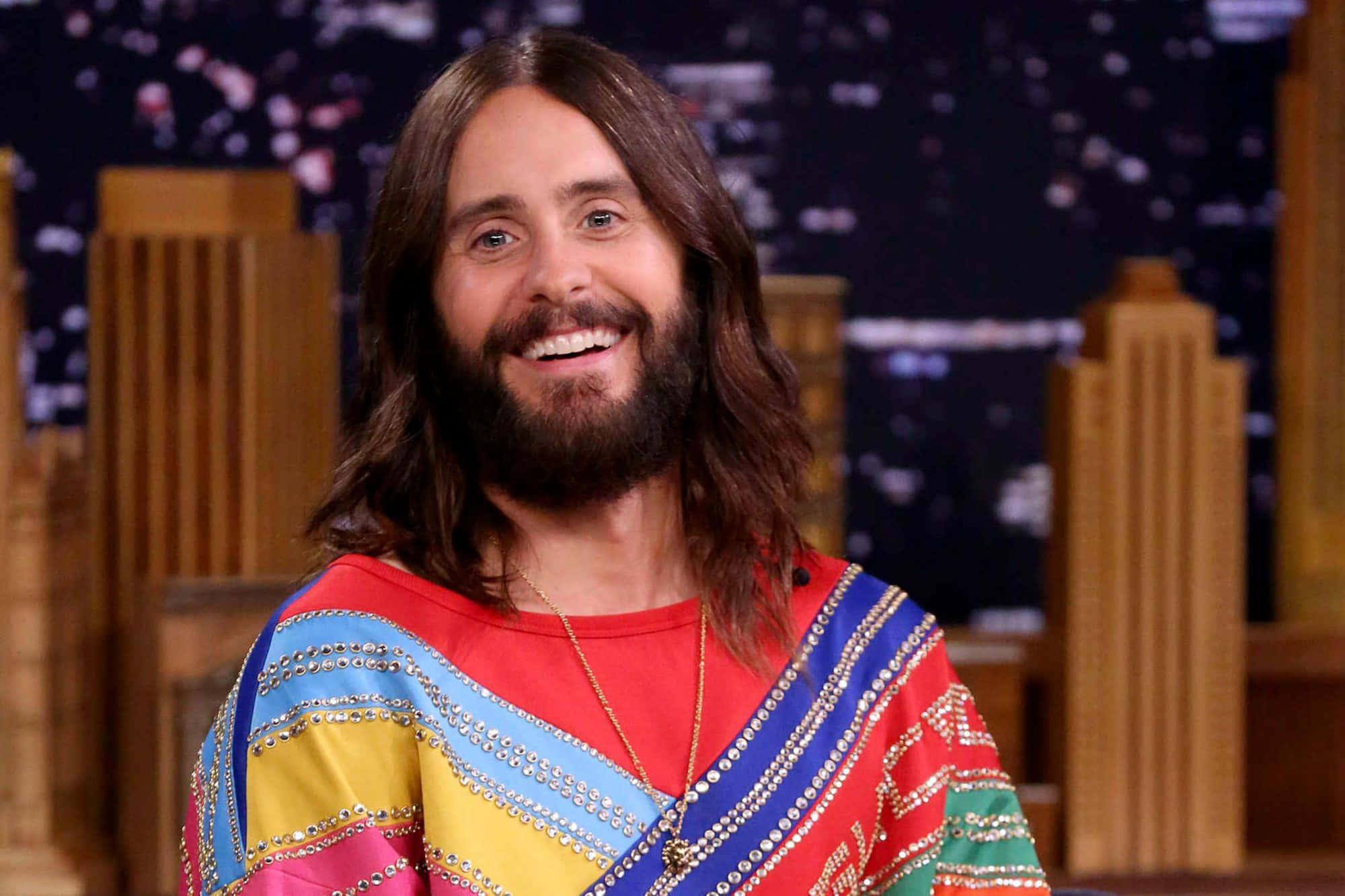 Jared Leto, colorful beaded top, cityscape backdrop, Full HD Desktop Wallpaper