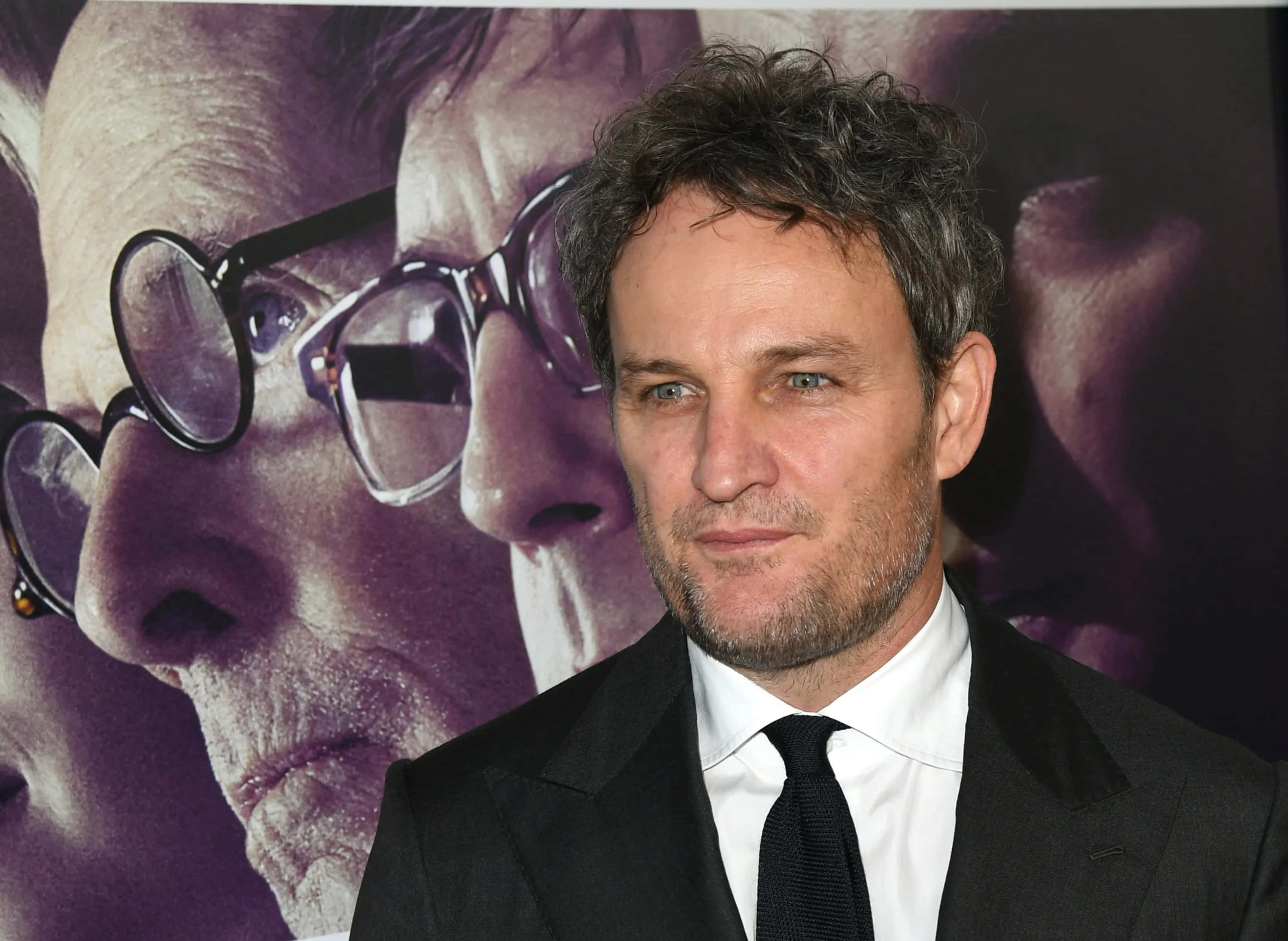 Jason Clarke, black suit and tie, purple-toned movie poster, 2K Desktop Wallpaper