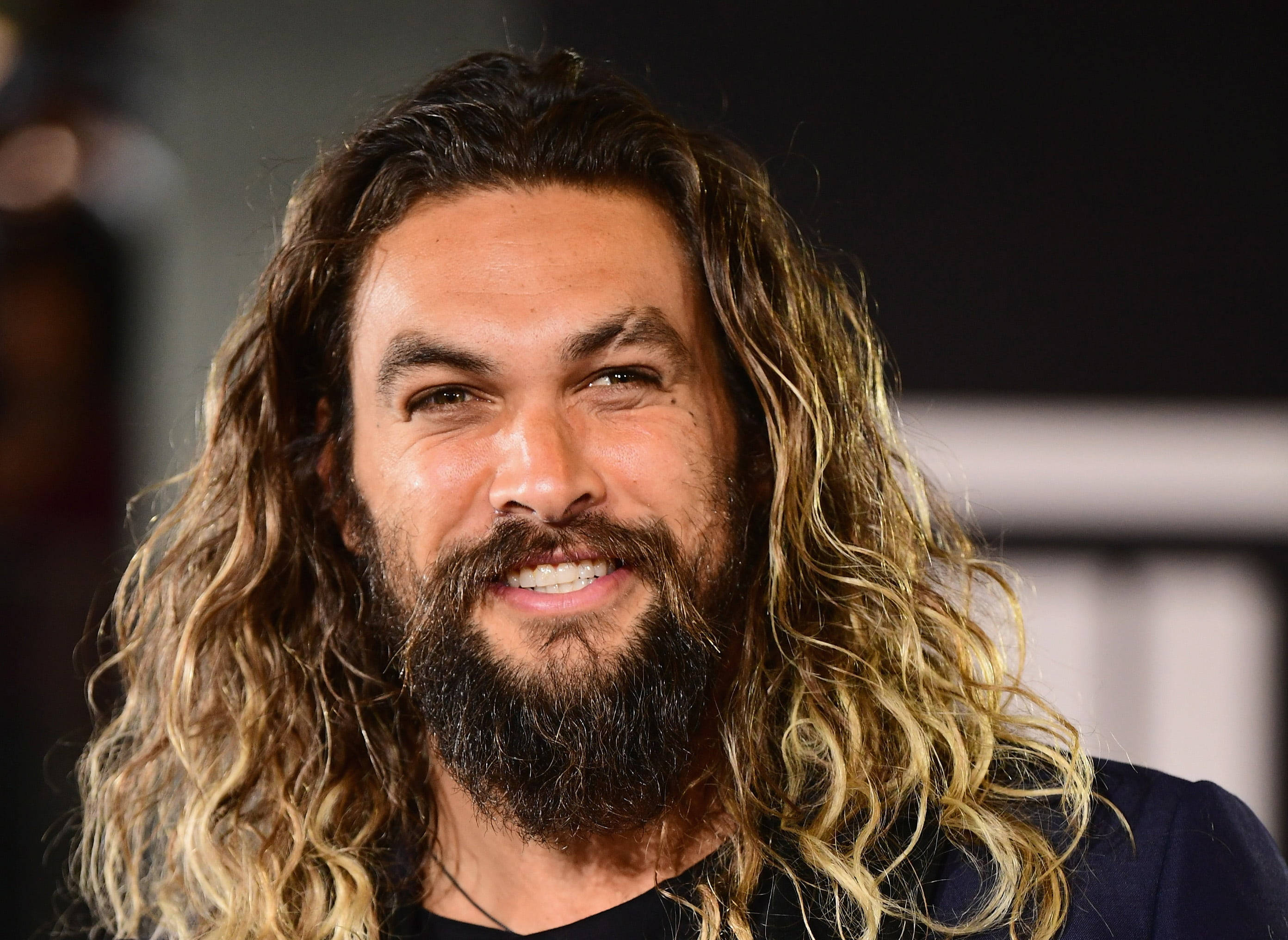 Jason Momoa, long wavy blonde hair, full beard, 2K Desktop Wallpaper