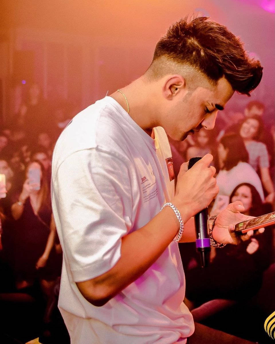 Jass Manak, singing onstage, white tee, SD Phone Wallpaper