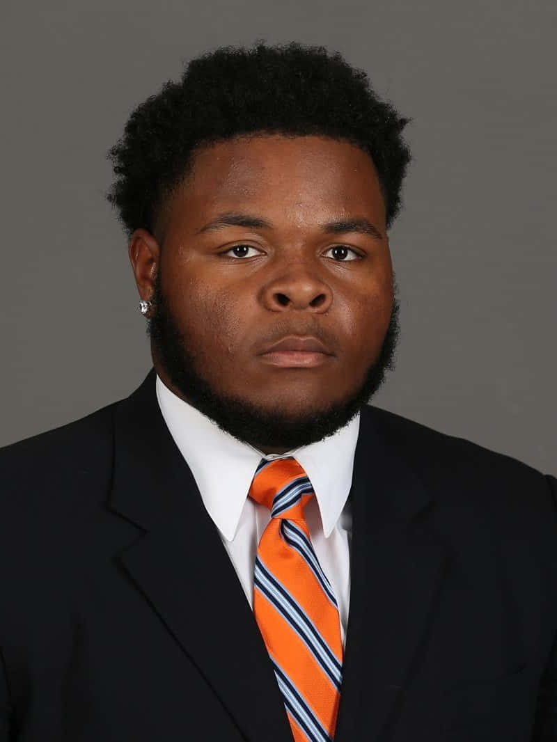 Jawaan Taylor, dark suit, orange striped tie, SD Phone Wallpaper