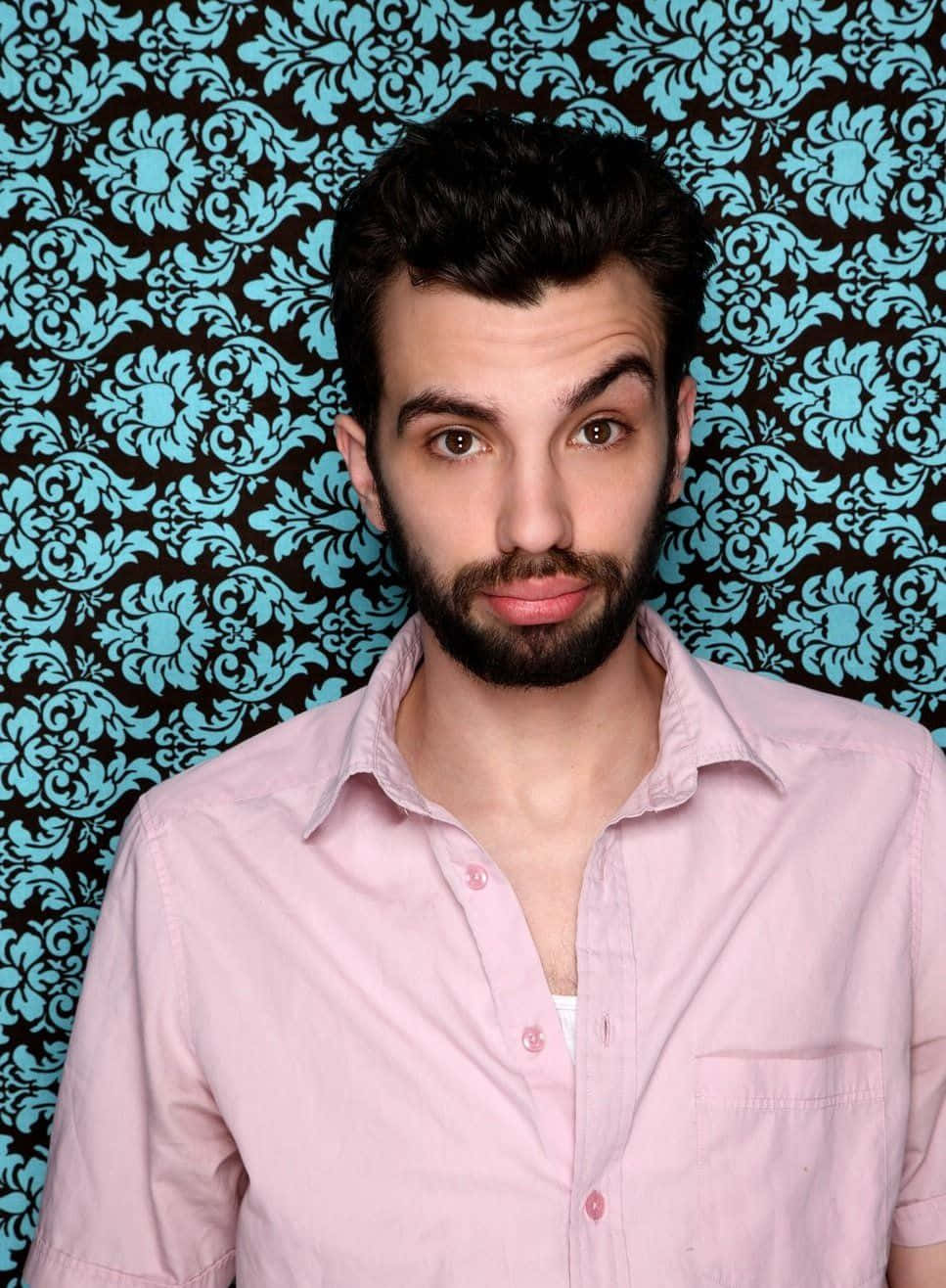 Jay Baruchel, pink button-up shirt, bold blue and black floral wallpaper, HD Phone Wallpaper
