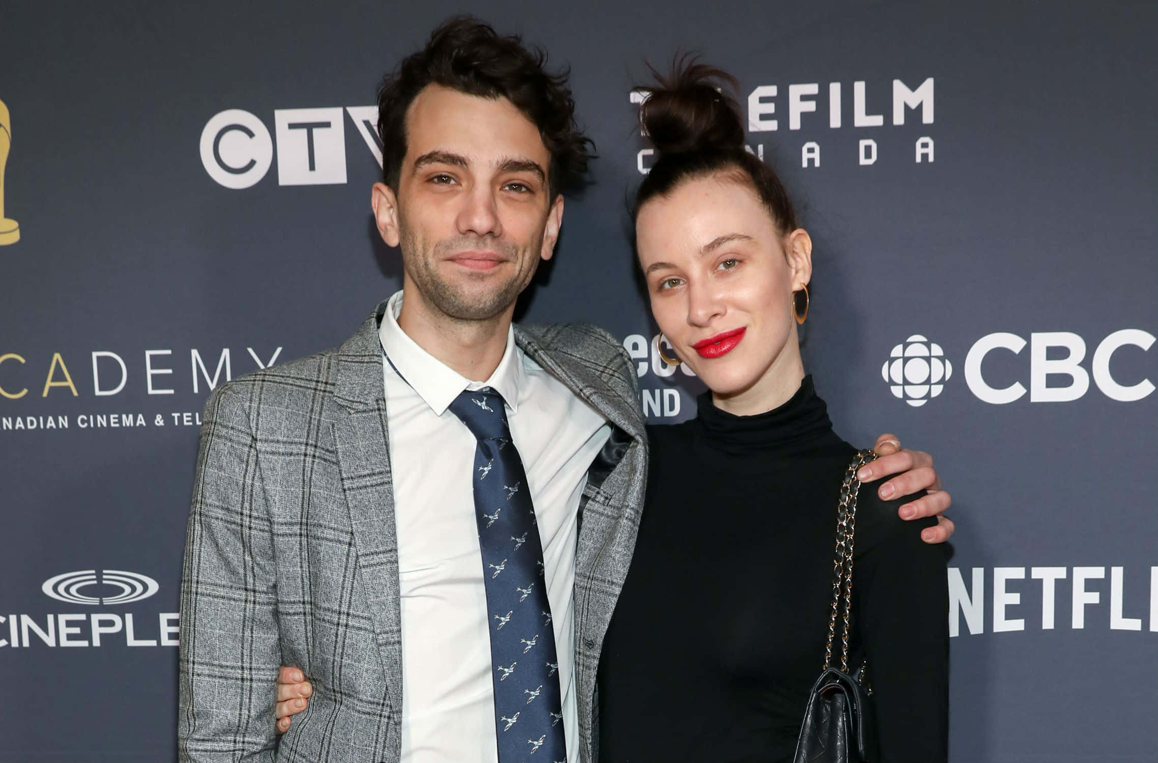 Jay Baruchel, gray plaid suit, black turtleneck, Full HD Desktop Wallpaper