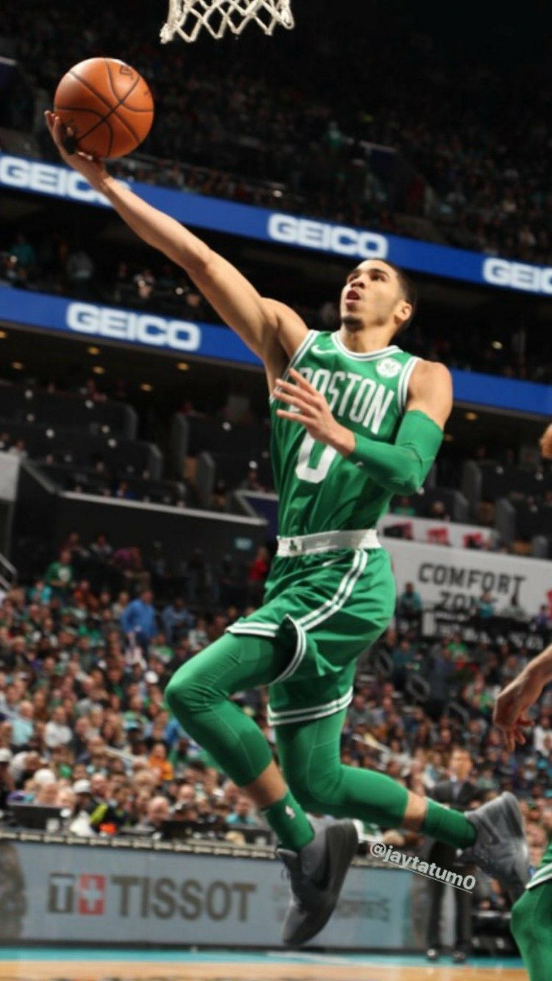Jayson Tatum, all green jersey, dunks the ball midair, Full HD Phone Wallpaper