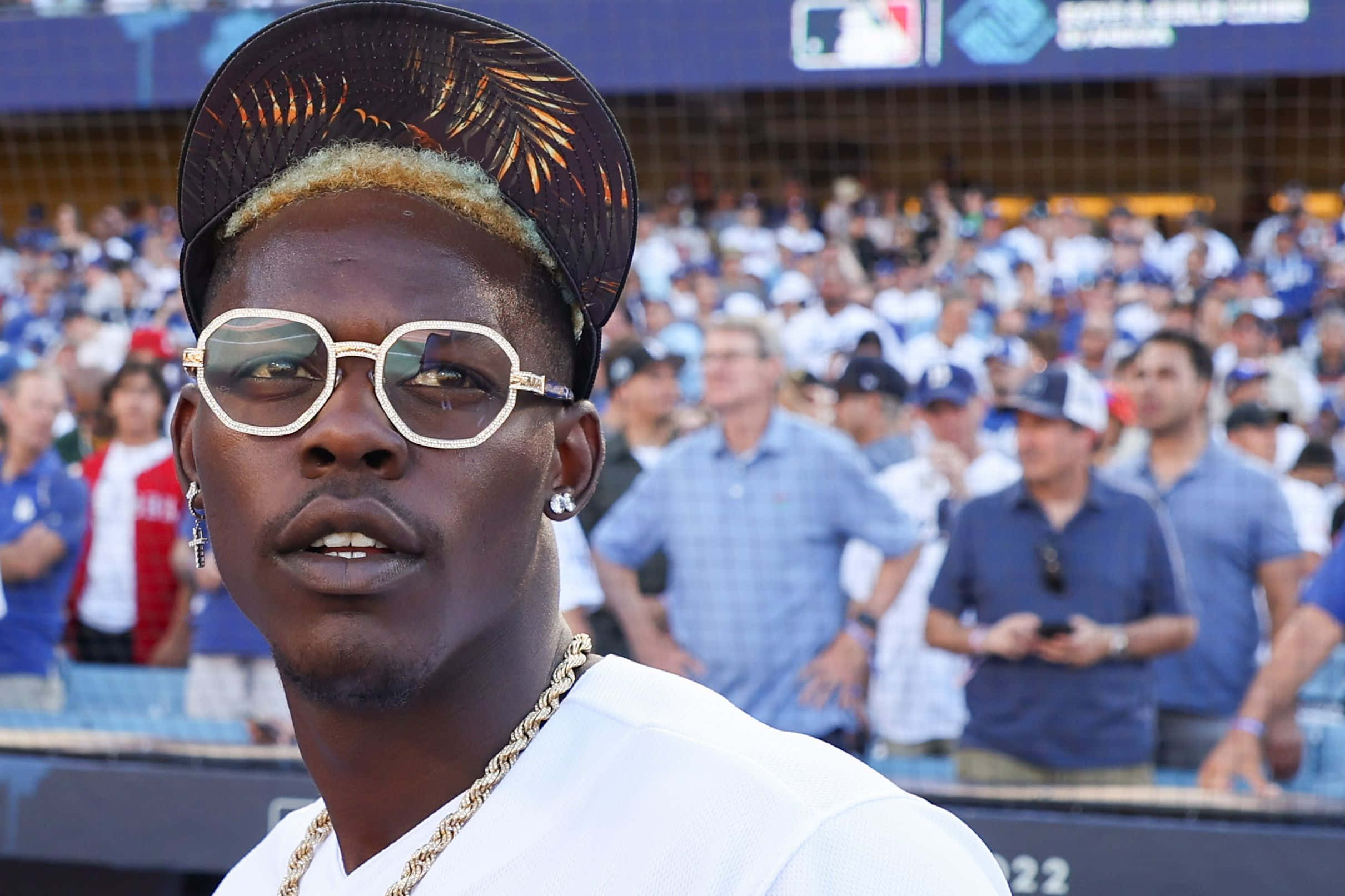 Jazz Chisholm, gold-trimmed sunglasses, patterned cap, Full HD Desktop Wallpaper