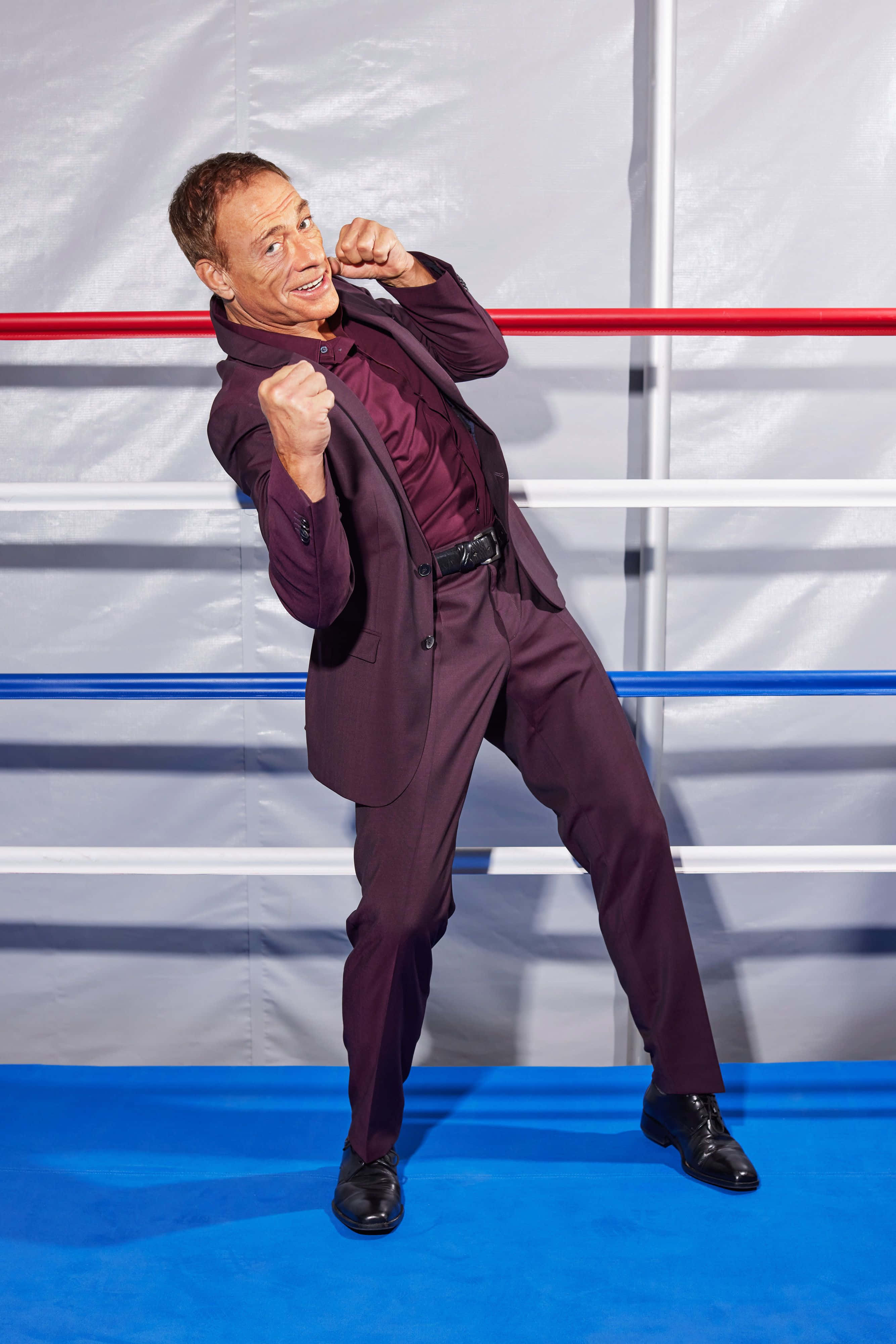 Jean Claude Van Damme, maroon suit, boxing pose, 4K Phone Wallpaper