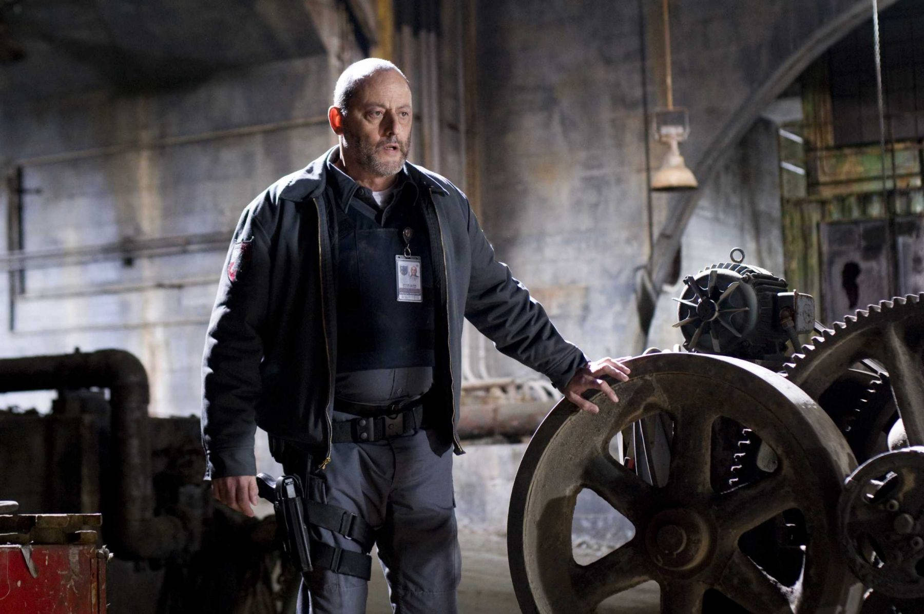 Jean Reno, black jacket, dim industrial warehouse, HD Desktop Wallpaper