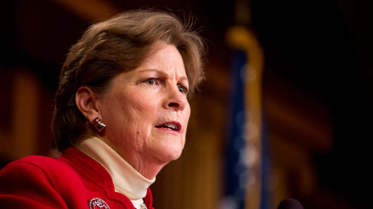 Jeanne Shaheen, red jacket, close-up photo, SD Desktop Wallpaper