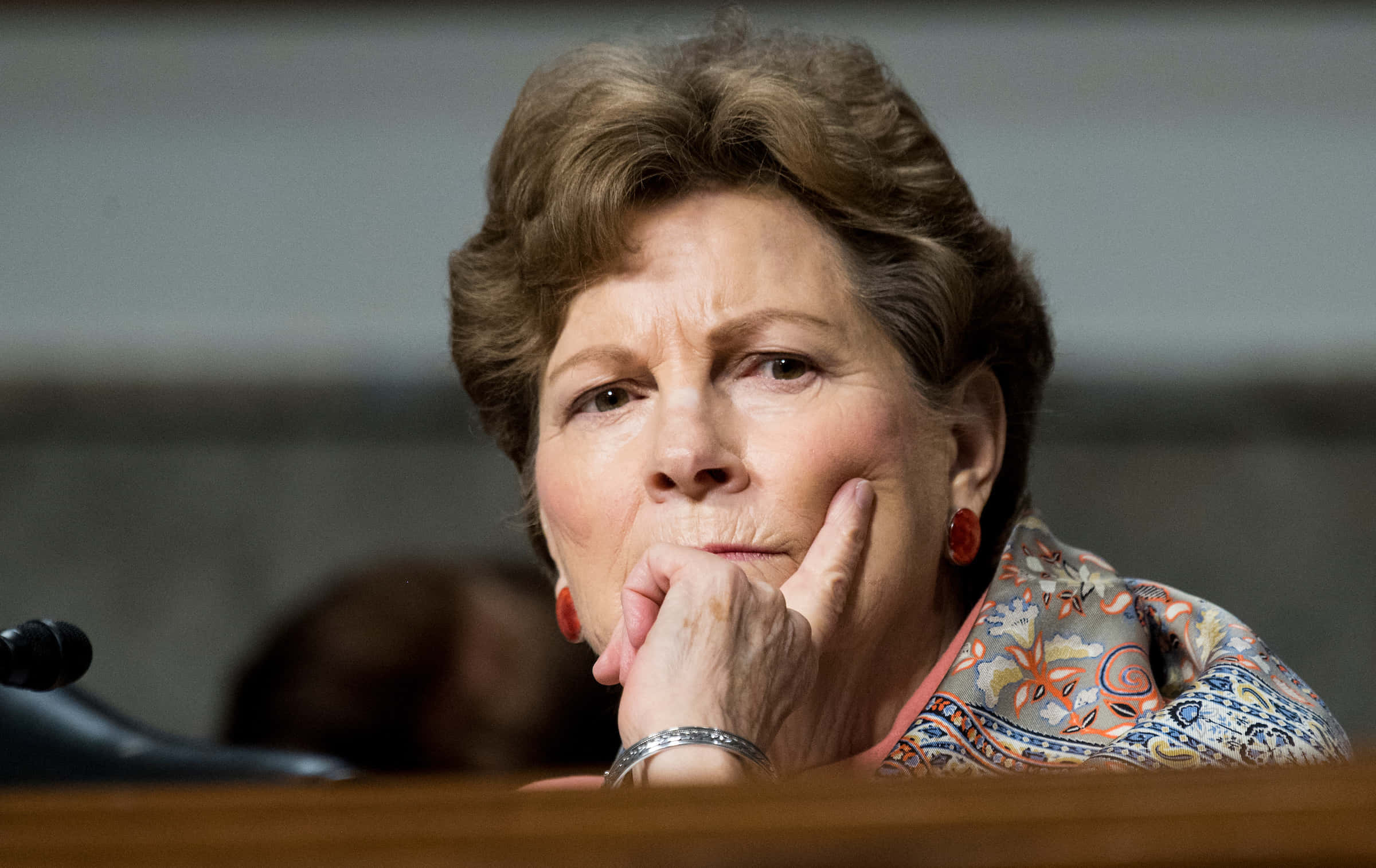Jeanne Shaheen, short brown hair, wooden table, Full HD Desktop Wallpaper