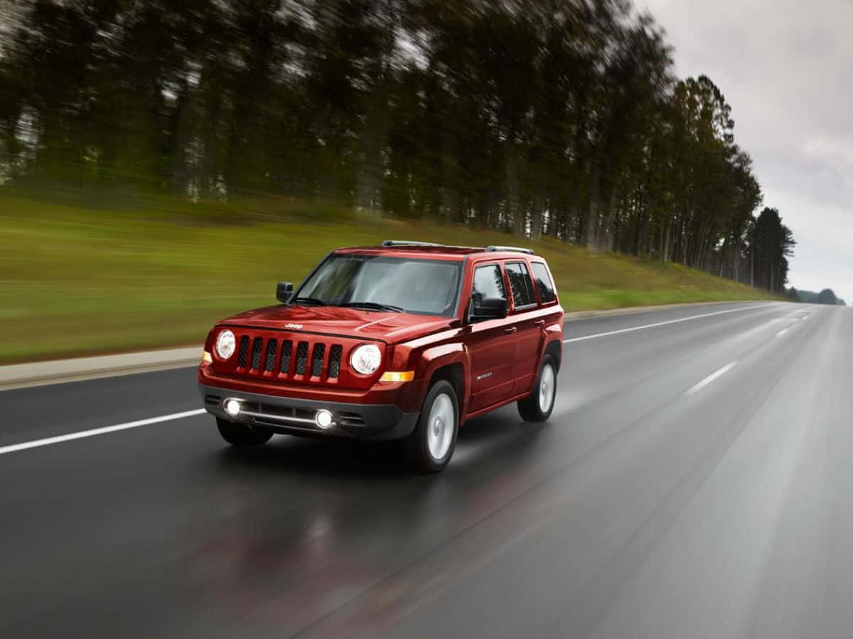 Jeep Patriot, red, wet highway, SD Desktop Wallpaper
