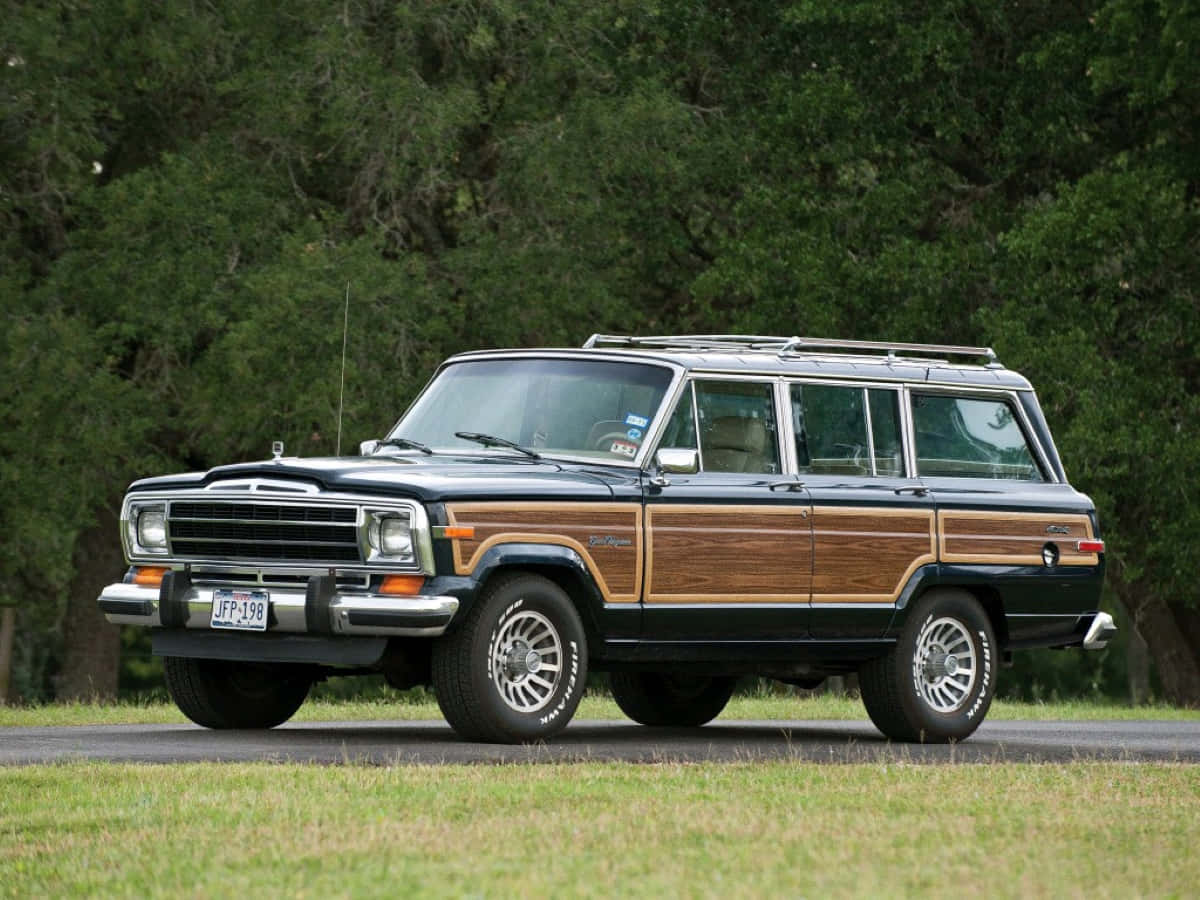 Jeep Wagoneer, wood-paneled, grassy roadside, SD Desktop Wallpaper