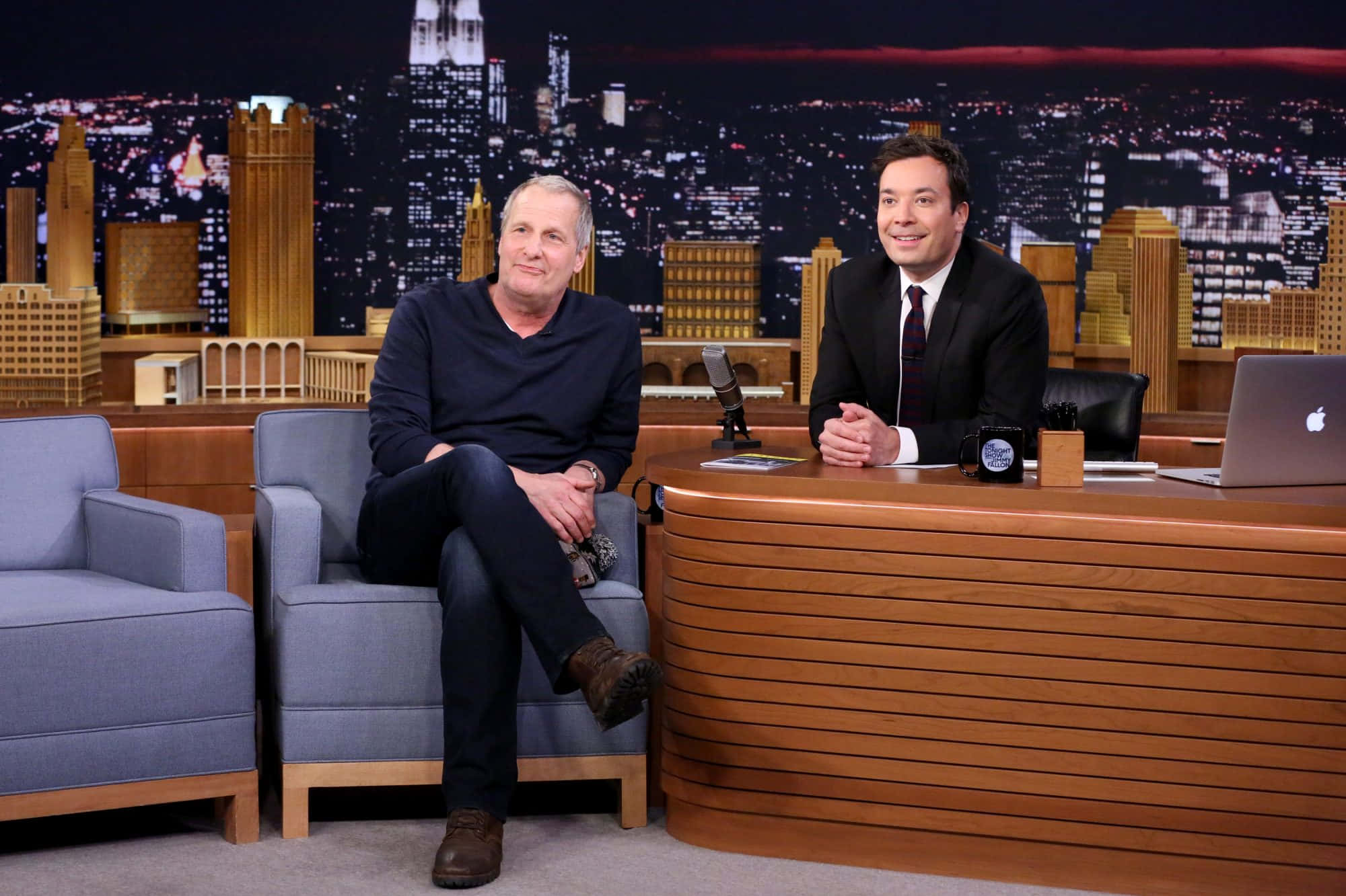 Jeff Daniels, talk show set, glowing city skyline, Full HD Desktop Wallpaper