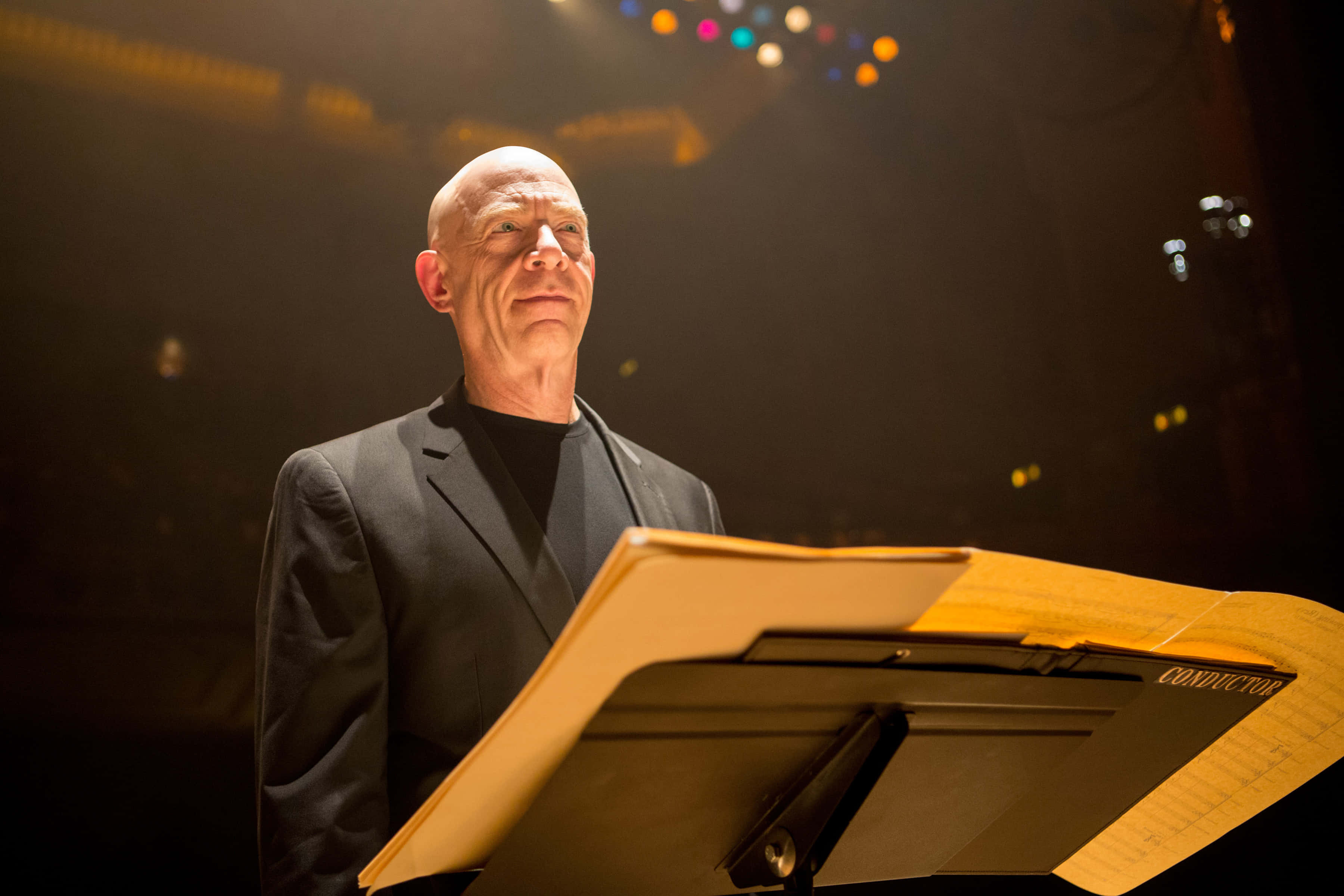 J.K. Simmons, black suit, conductor's podium, 2K Desktop Wallpaper