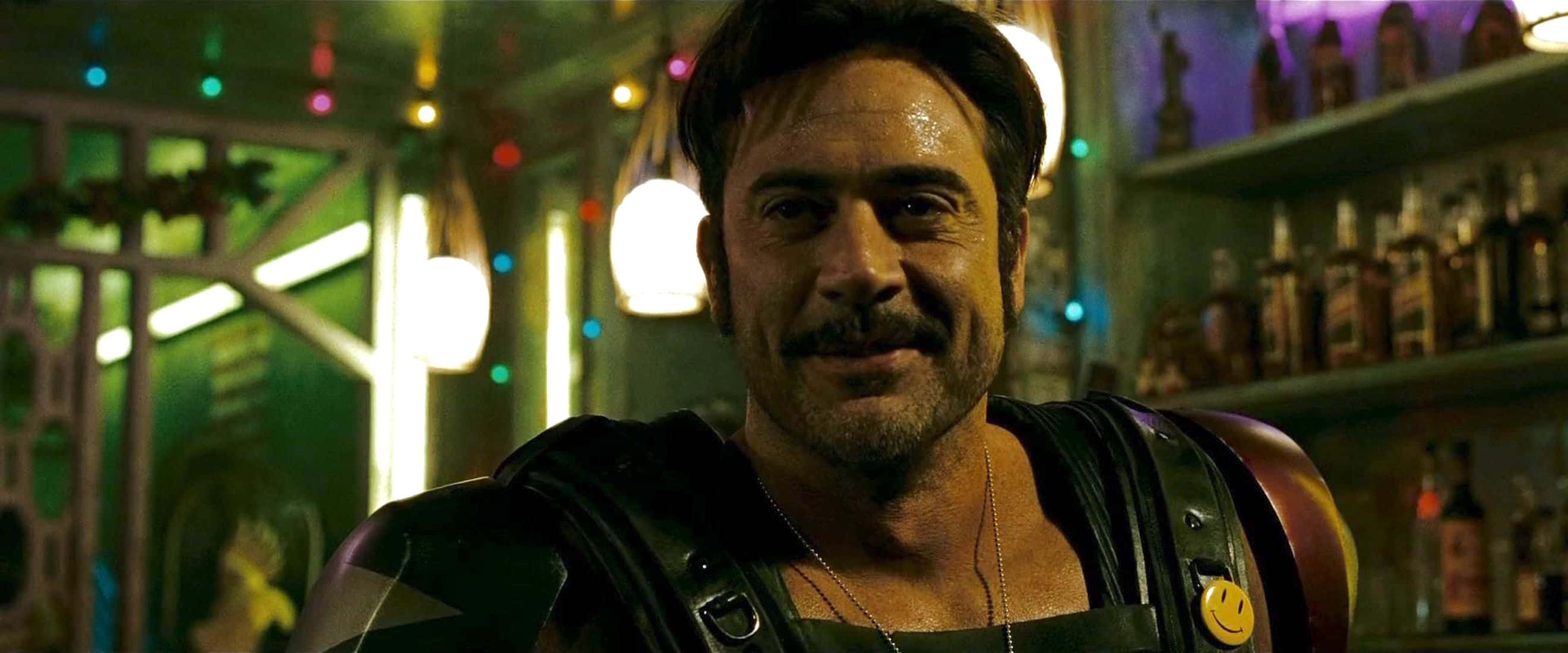 Jeffrey Dean Morgan, neon-lit bar, colorful string lights, 2K Desktop Wallpaper