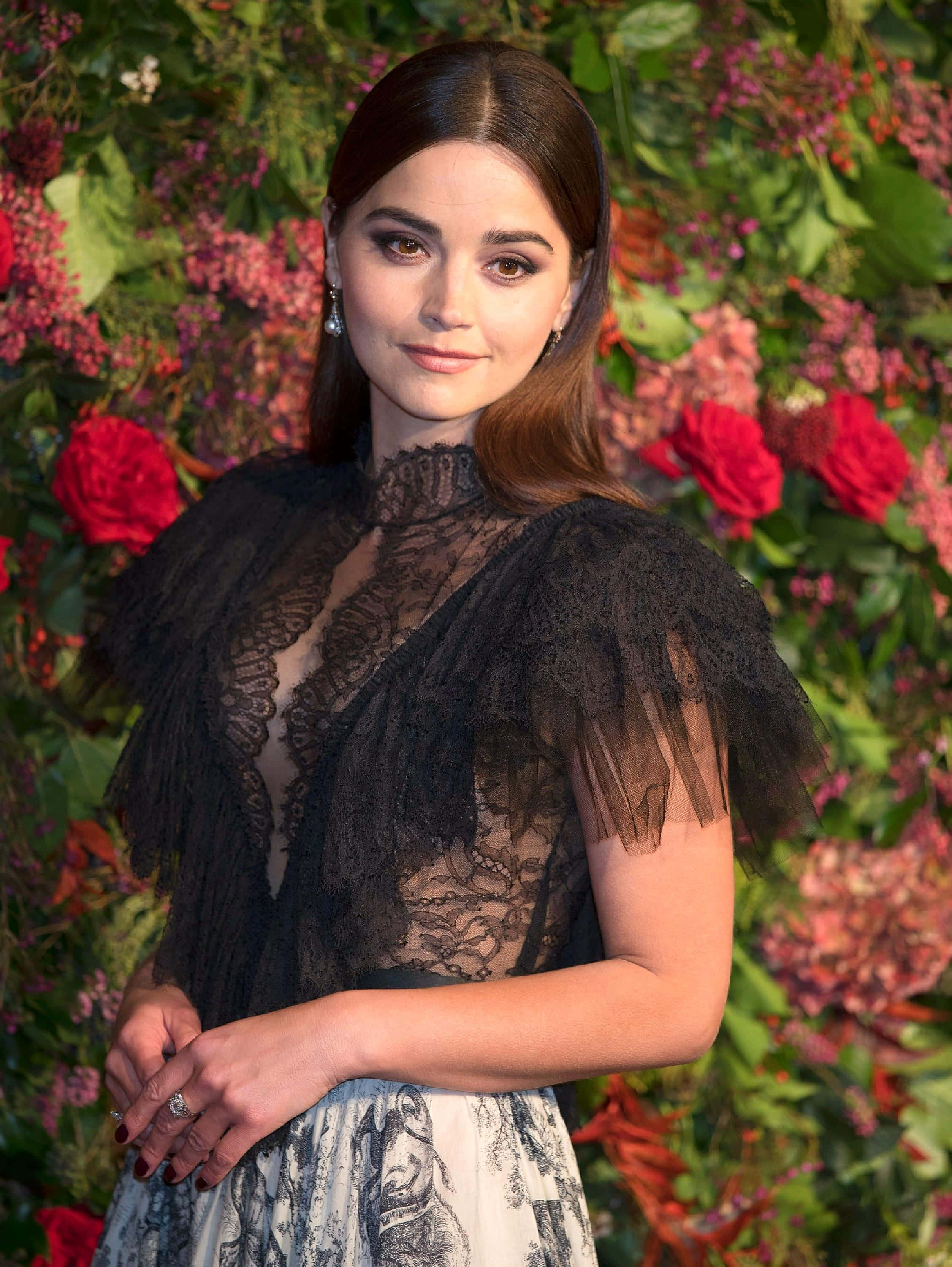 Jenna Coleman, black lace top, lush floral wall, 2K Phone Wallpaper