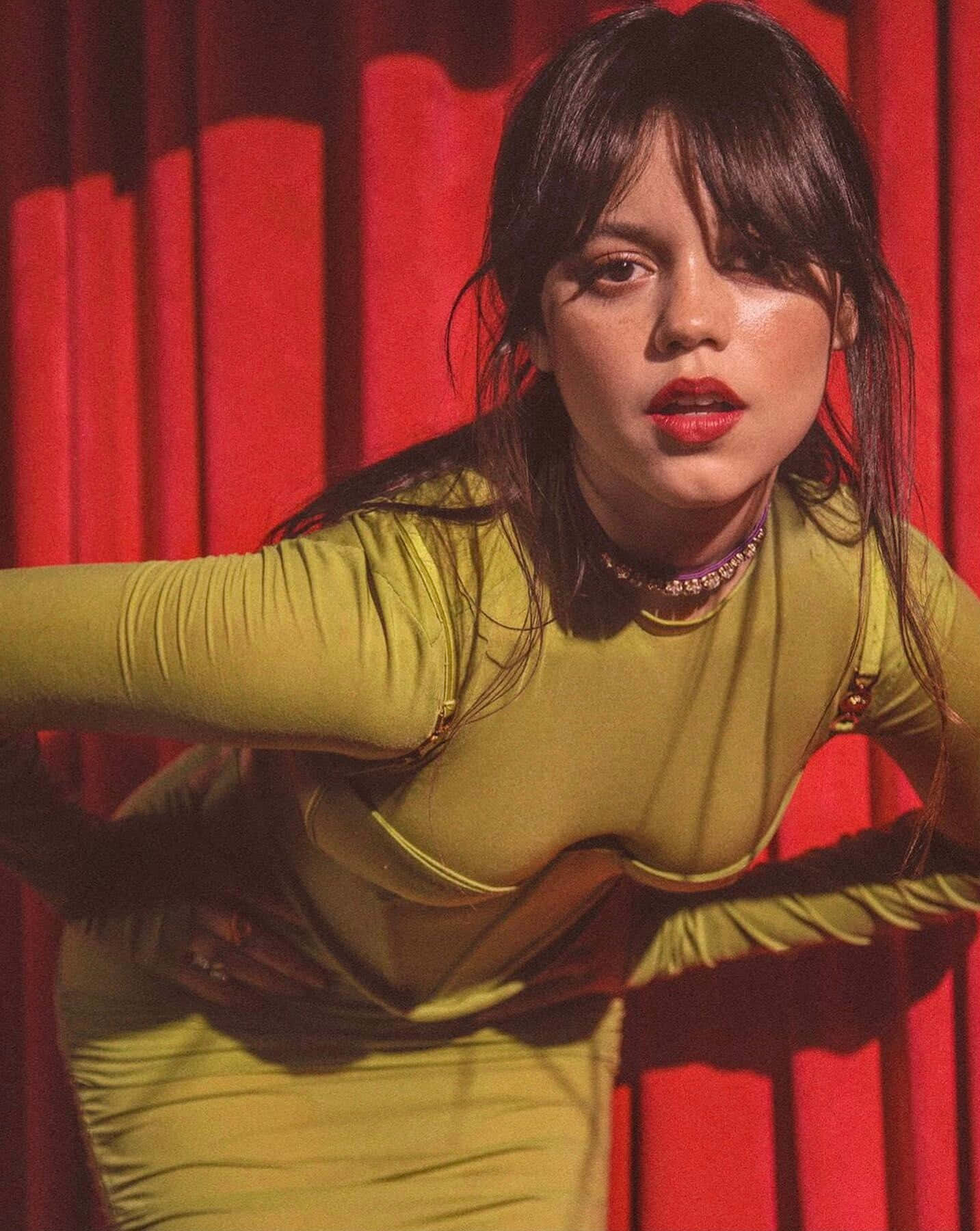 Jenna Ortega, olive green dress, vibrant red curtain backdrop, HD Phone Wallpaper