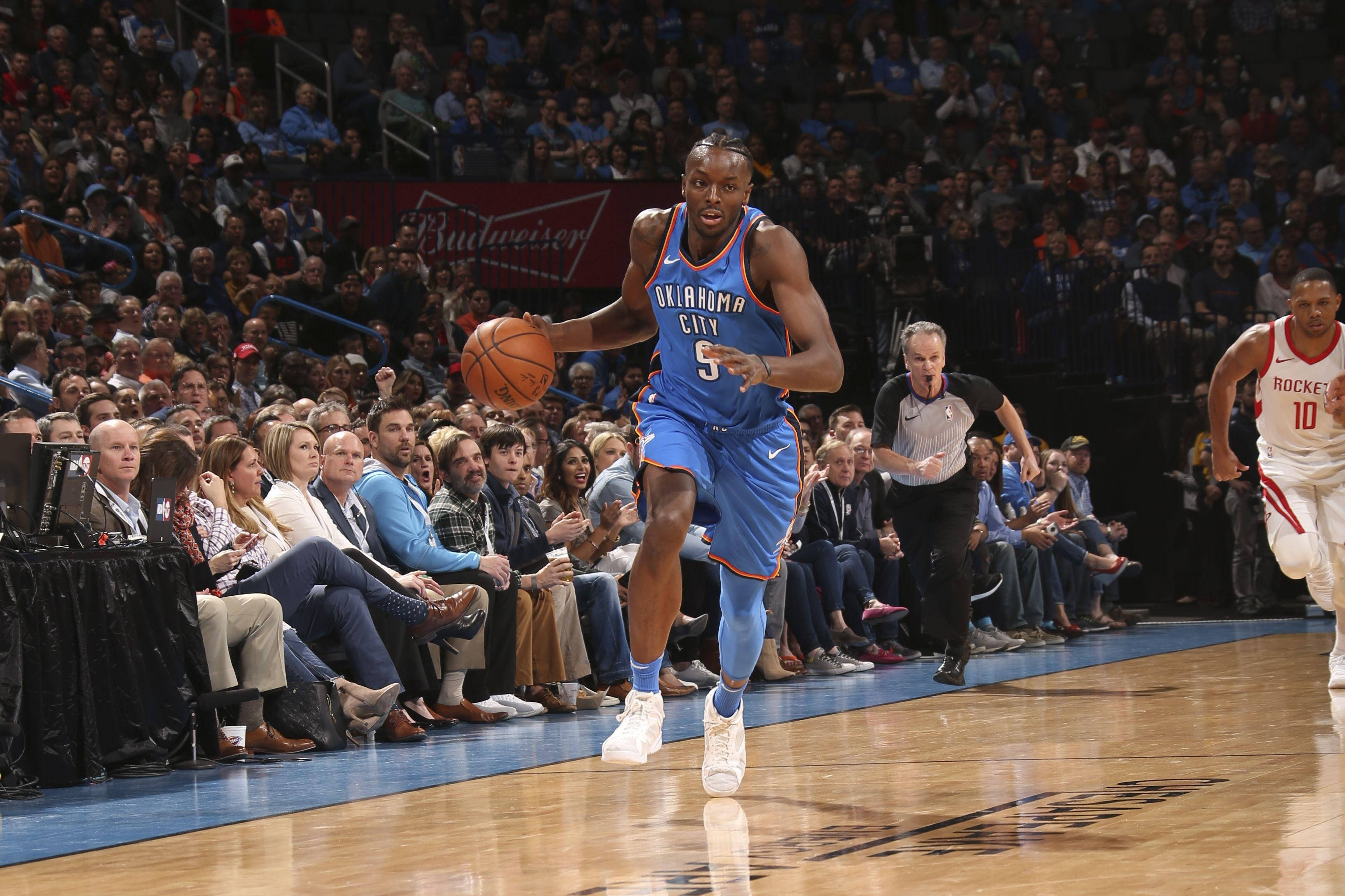 Jerami Grant, blue Oklahoma City jersey, dribbles the ball, 2K Desktop Wallpaper