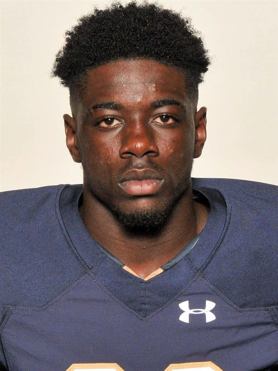 Jeremiah Owusu Koramoah, navy blue Under Armour jersey, gold accents, SD Phone Wallpaper