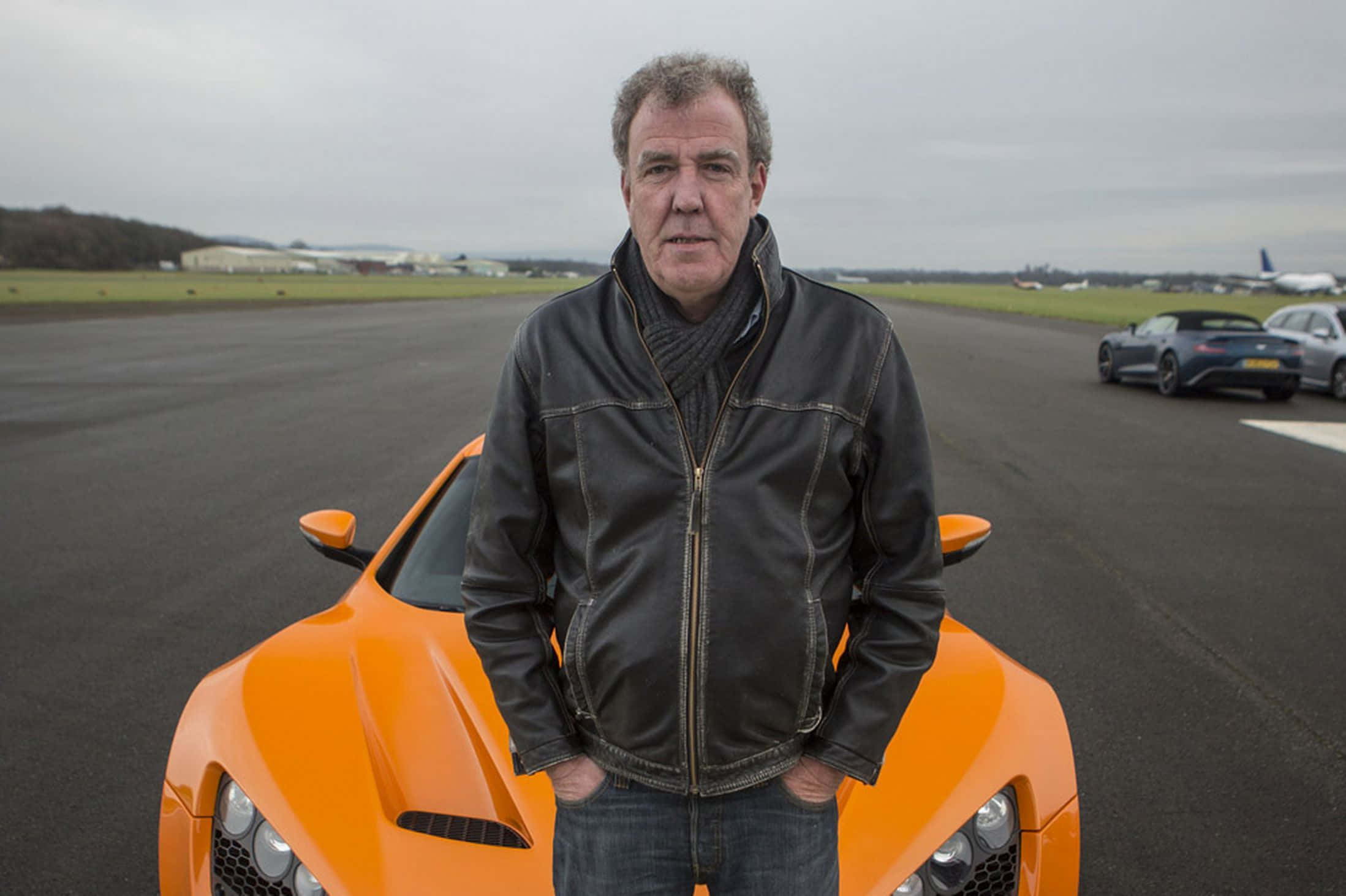 Jeremy Clarkson, black leather jacket, bright orange sports car, Full HD Desktop Wallpaper
