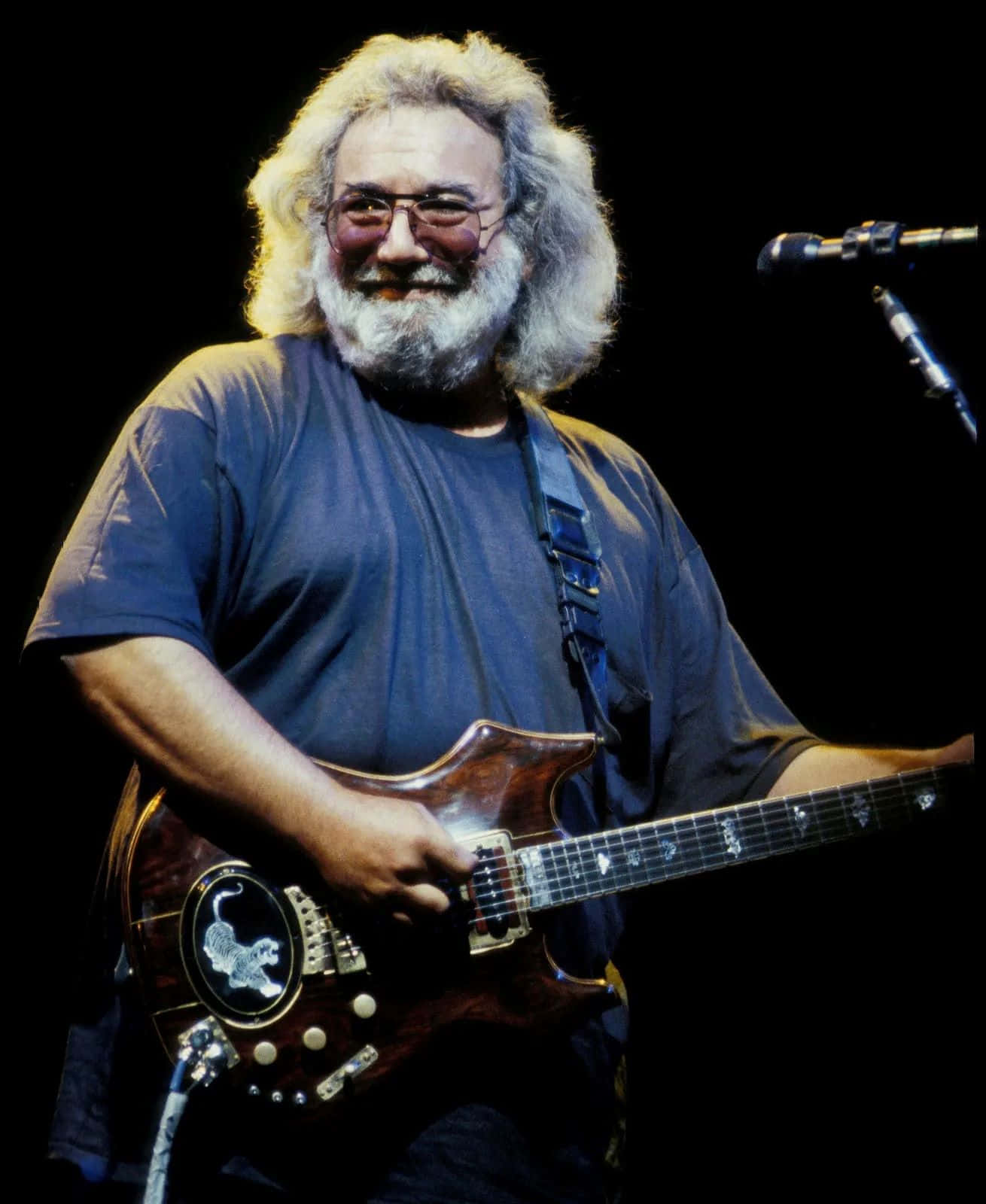 Jerry Garcia, dark wood electric guitar, black stage, HD Phone Wallpaper