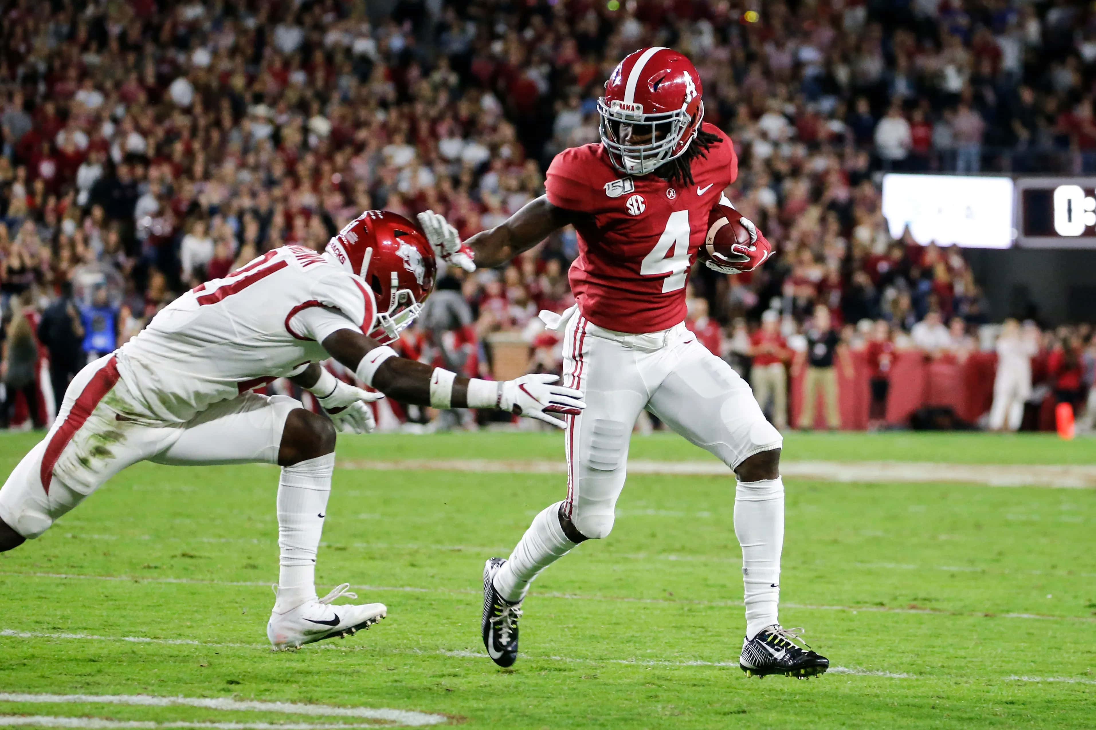 Jerry Jeudy, red jersey number 4, white-uniformed defender, 2K Desktop Wallpaper