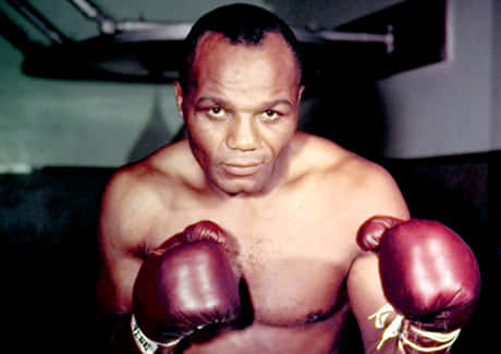 Jersey Joe Walcott, red gloves, dimly lit gym, SD Desktop Wallpaper