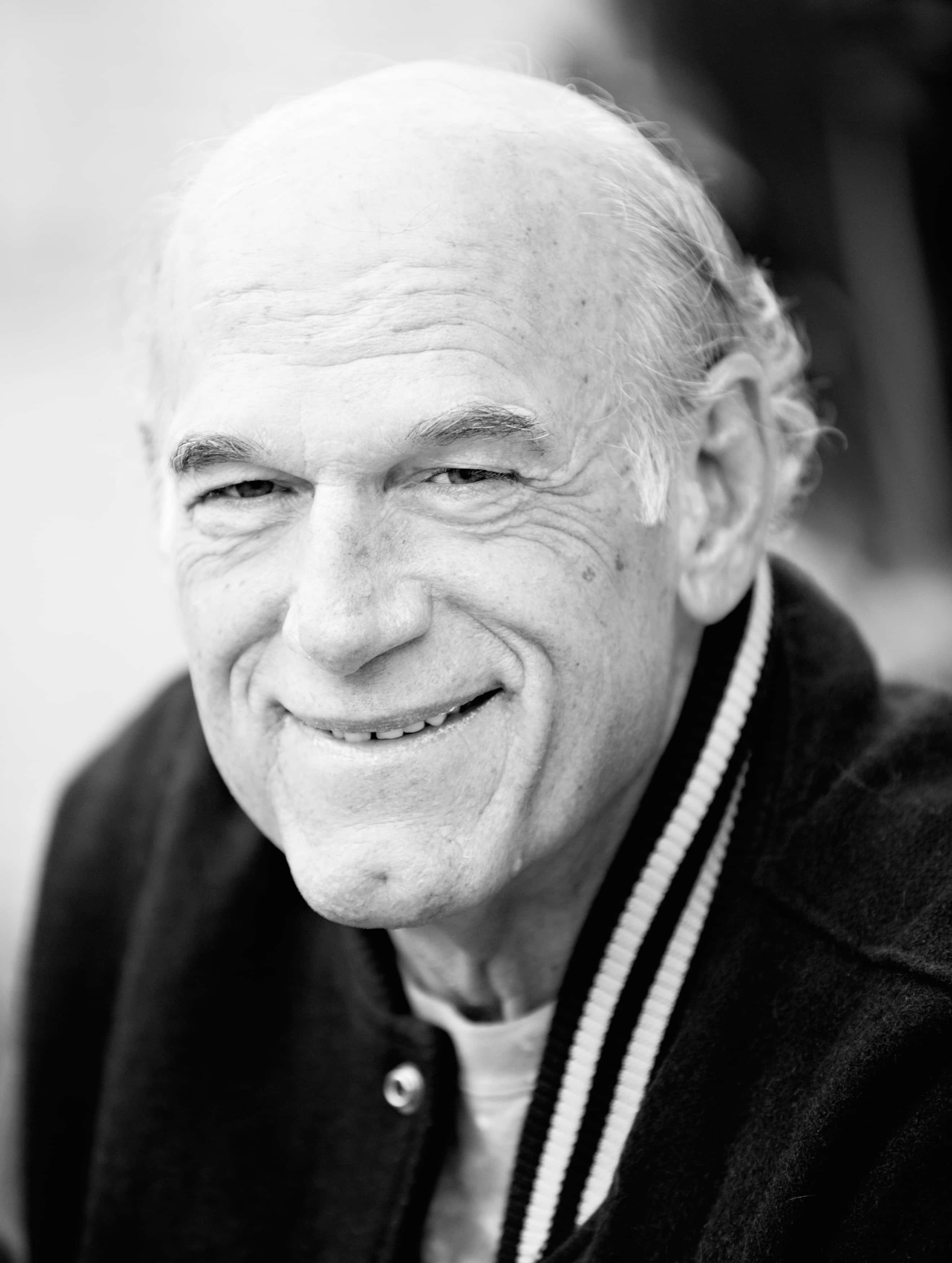 Jesse Ventura, black and white portrait, smiling elderly man, 2K Phone Wallpaper