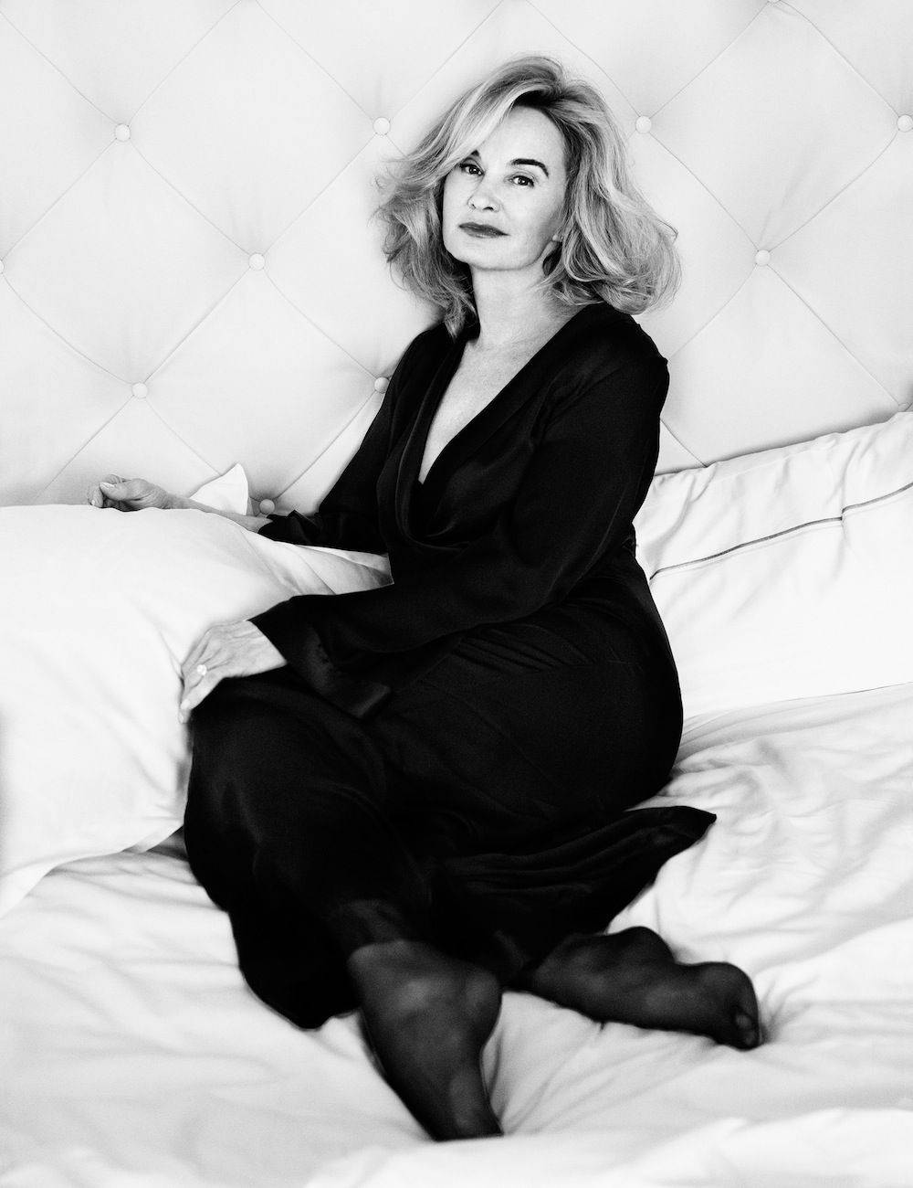 Jessica Lange, black dress, white tufted bed, HD Phone Wallpaper