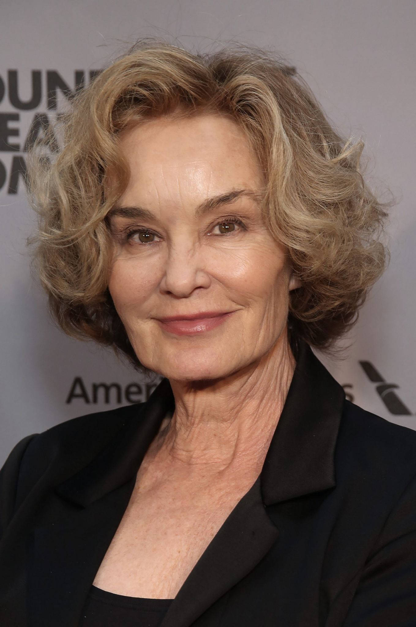 Jessica Lange, wavy blonde hair, black blazer, Full HD Phone Wallpaper