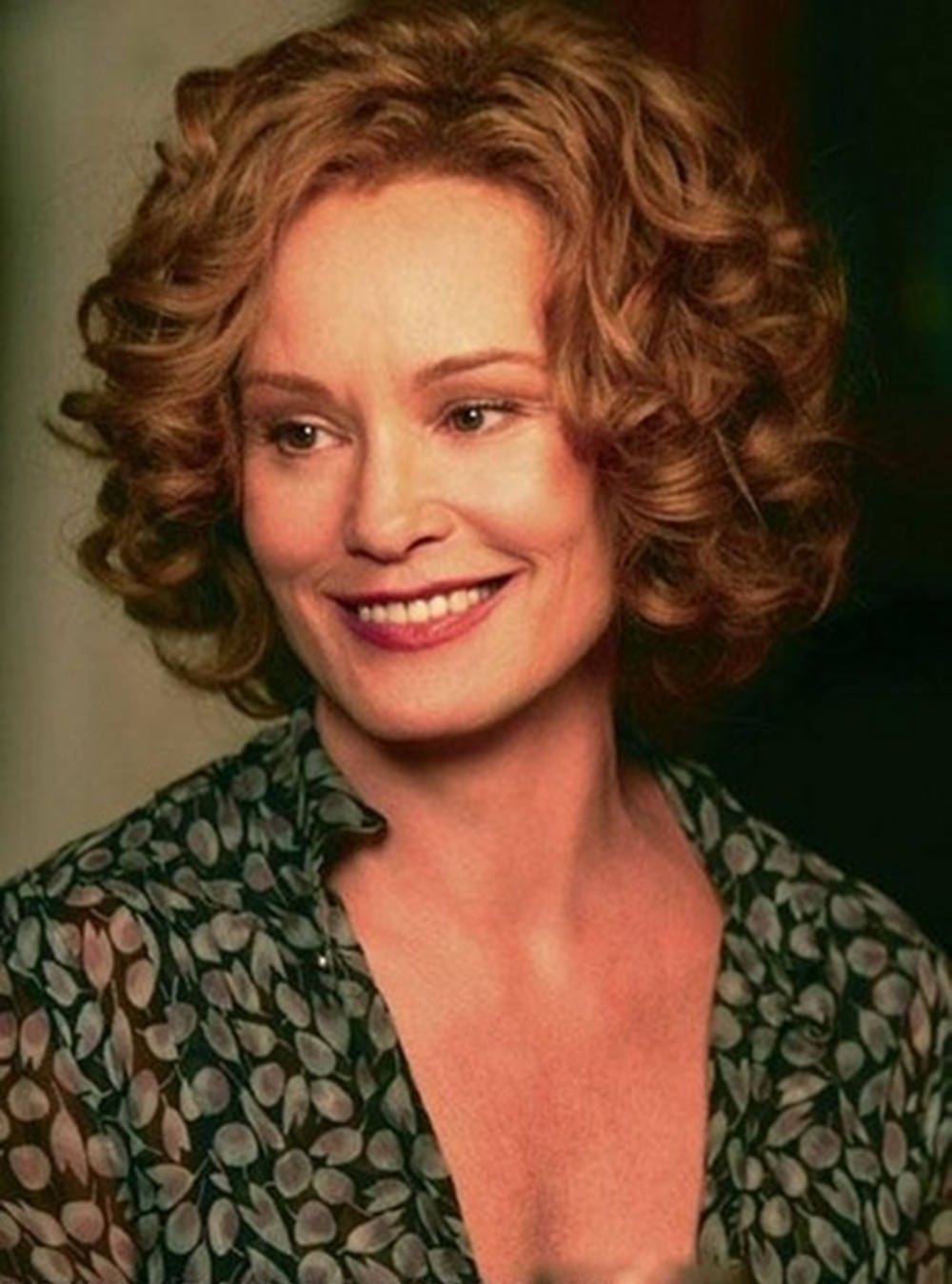 Jessica Lange, curly auburn hair, leaf-patterned blouse, HD Phone Wallpaper