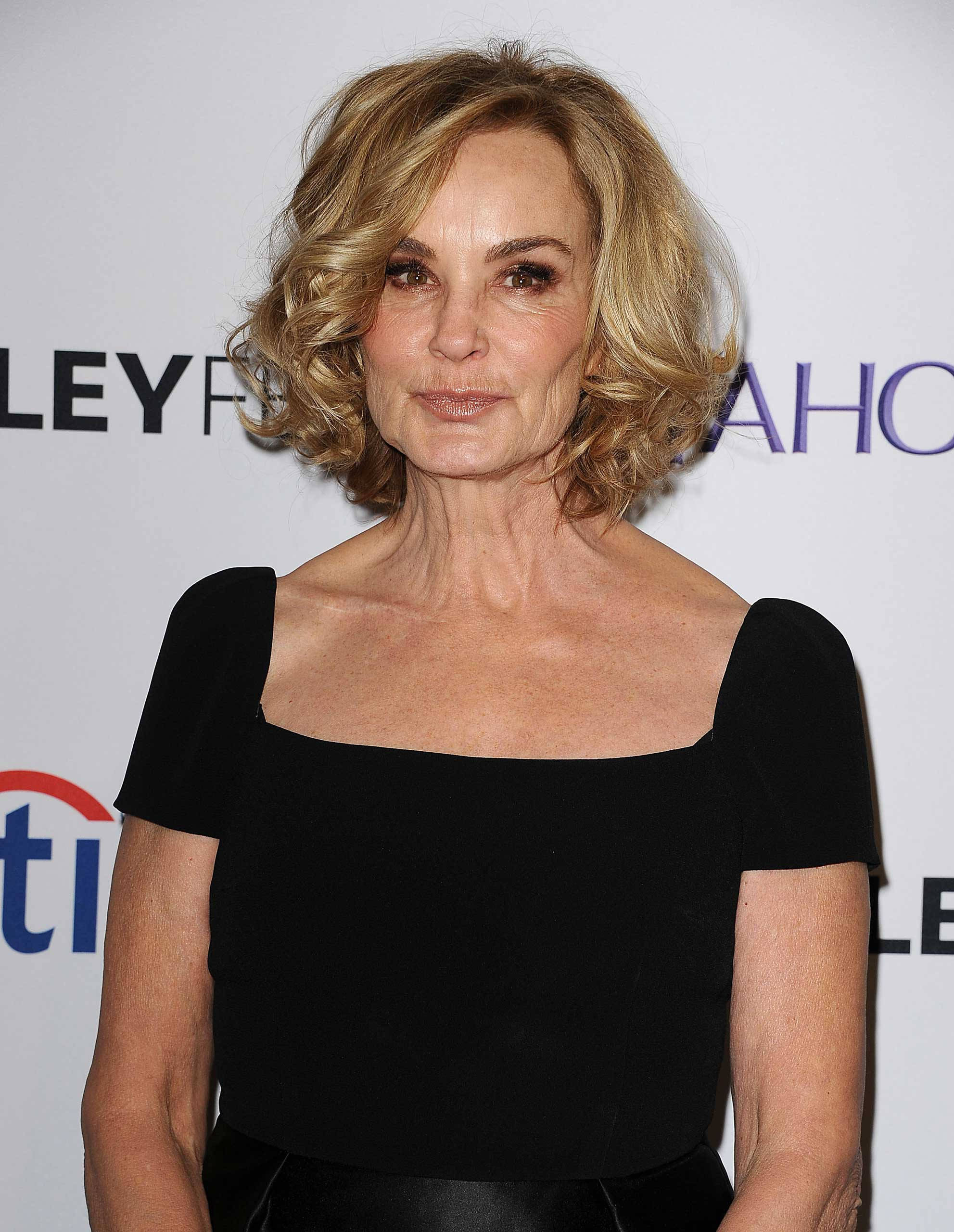 Jessica Lange, wavy blonde hair, black square-neck top, 2K Phone Wallpaper