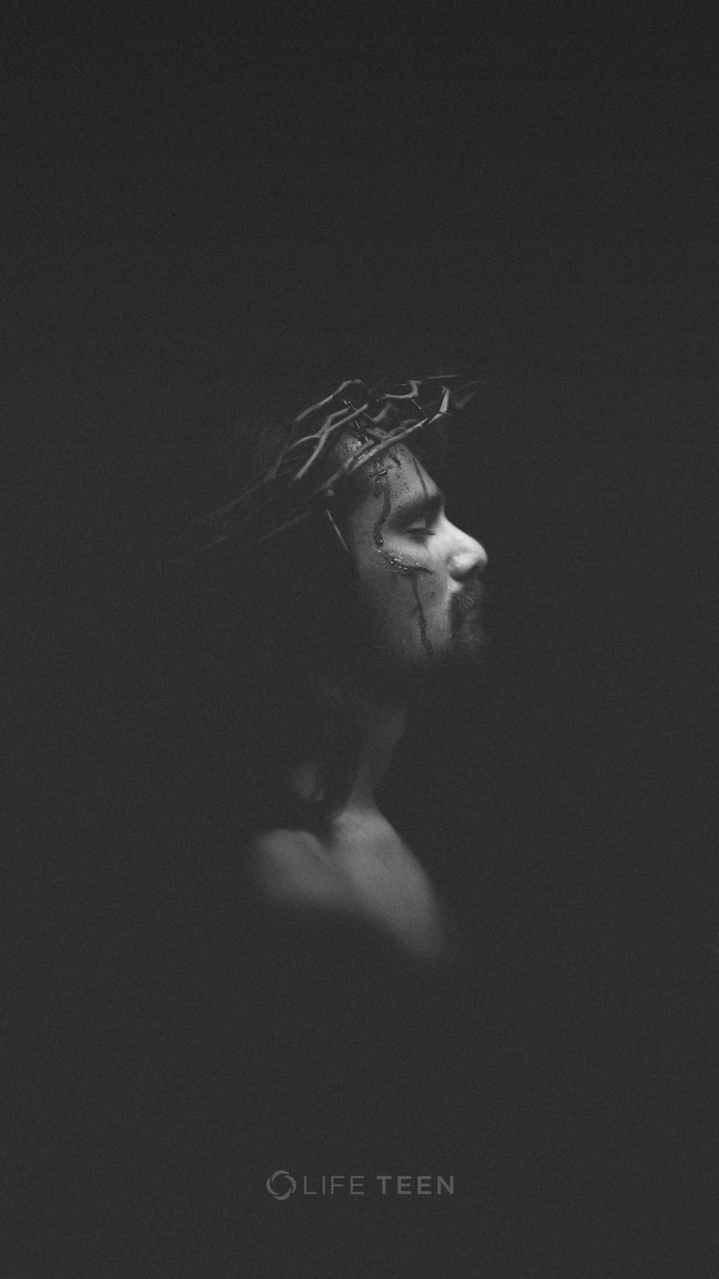 Jesus, crown of thorns, blood trickling down his cheek, 2K Phone Wallpaper