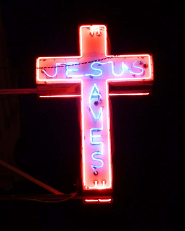 Jesus Saves, glowing red and blue neon cross, bright letters, SD Phone Wallpaper