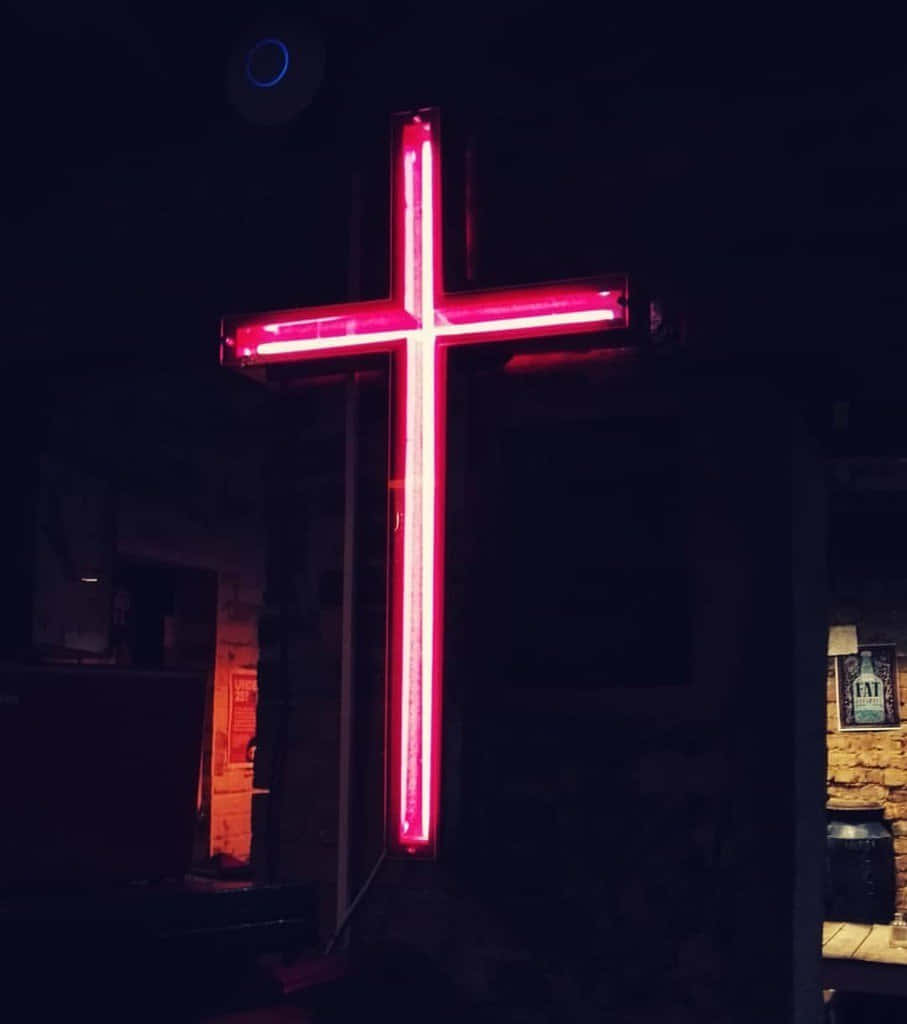 Jesus Saves, glowing red neon cross, dark urban night, SD Phone Wallpaper