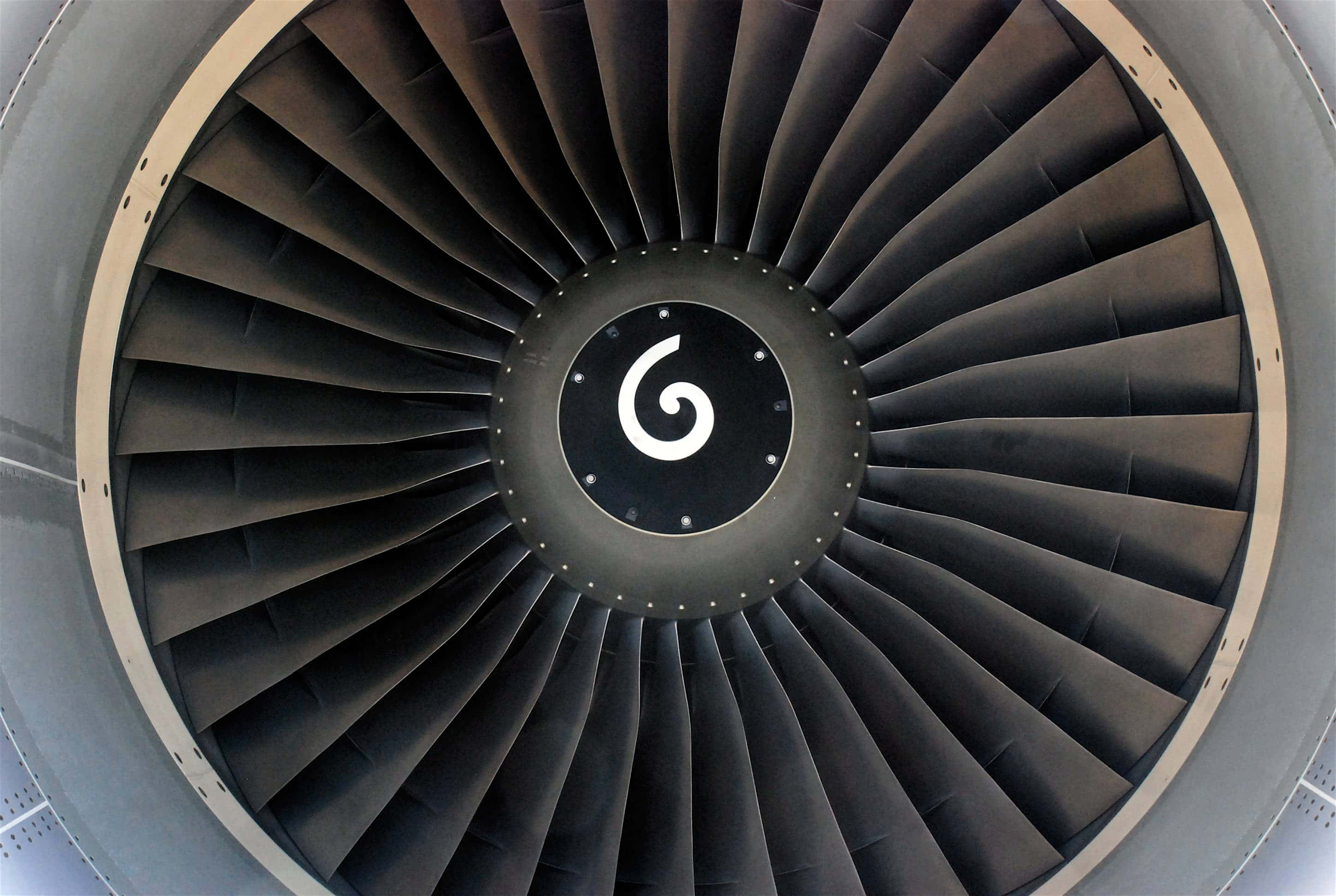 jet engine, fan blades, central swirl logo, 2K Desktop Wallpaper