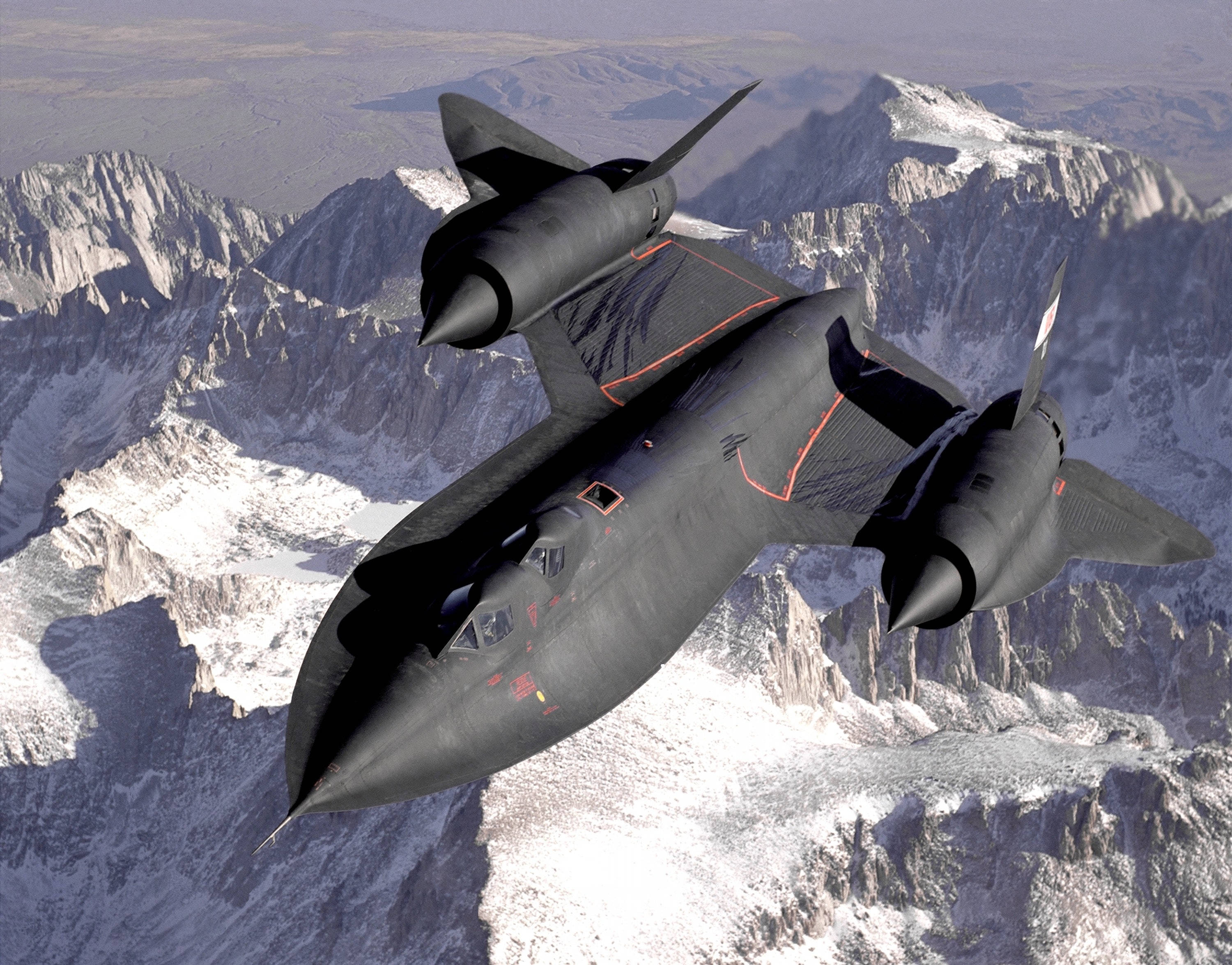 modern fighter plane, sleek black stealth fighter, snowcapped mountain peaks, 2K Desktop Wallpaper