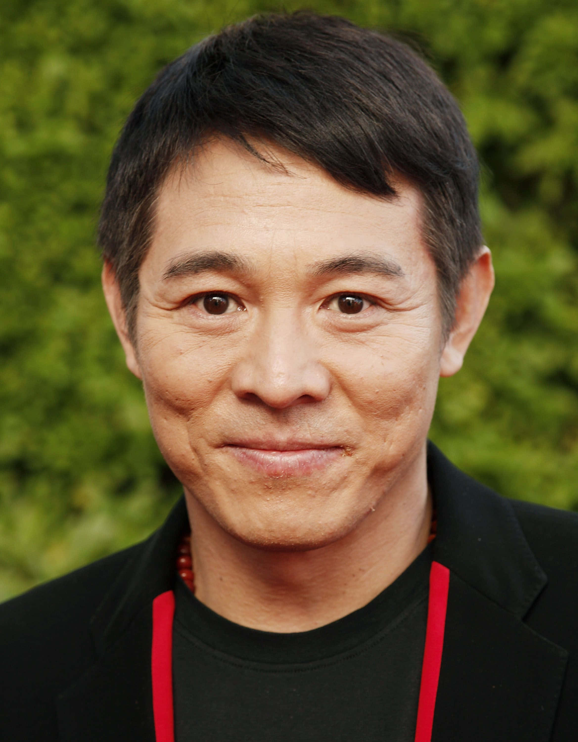 Jet Li, close-up portrait, dark hair, 2K Phone Wallpaper
